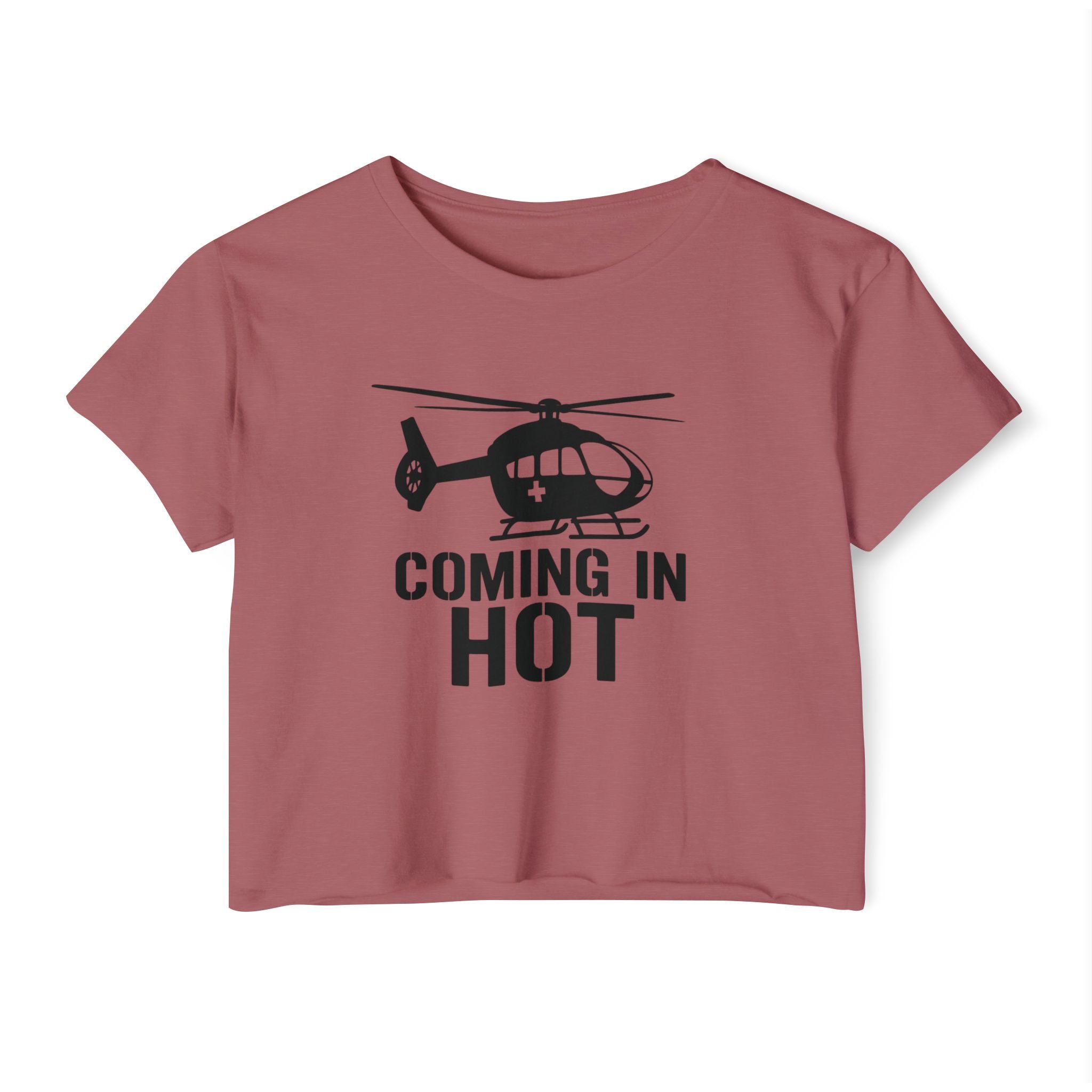 Pink crop top with helicopter graphic and text 'COMING IN HOT' on a white background
