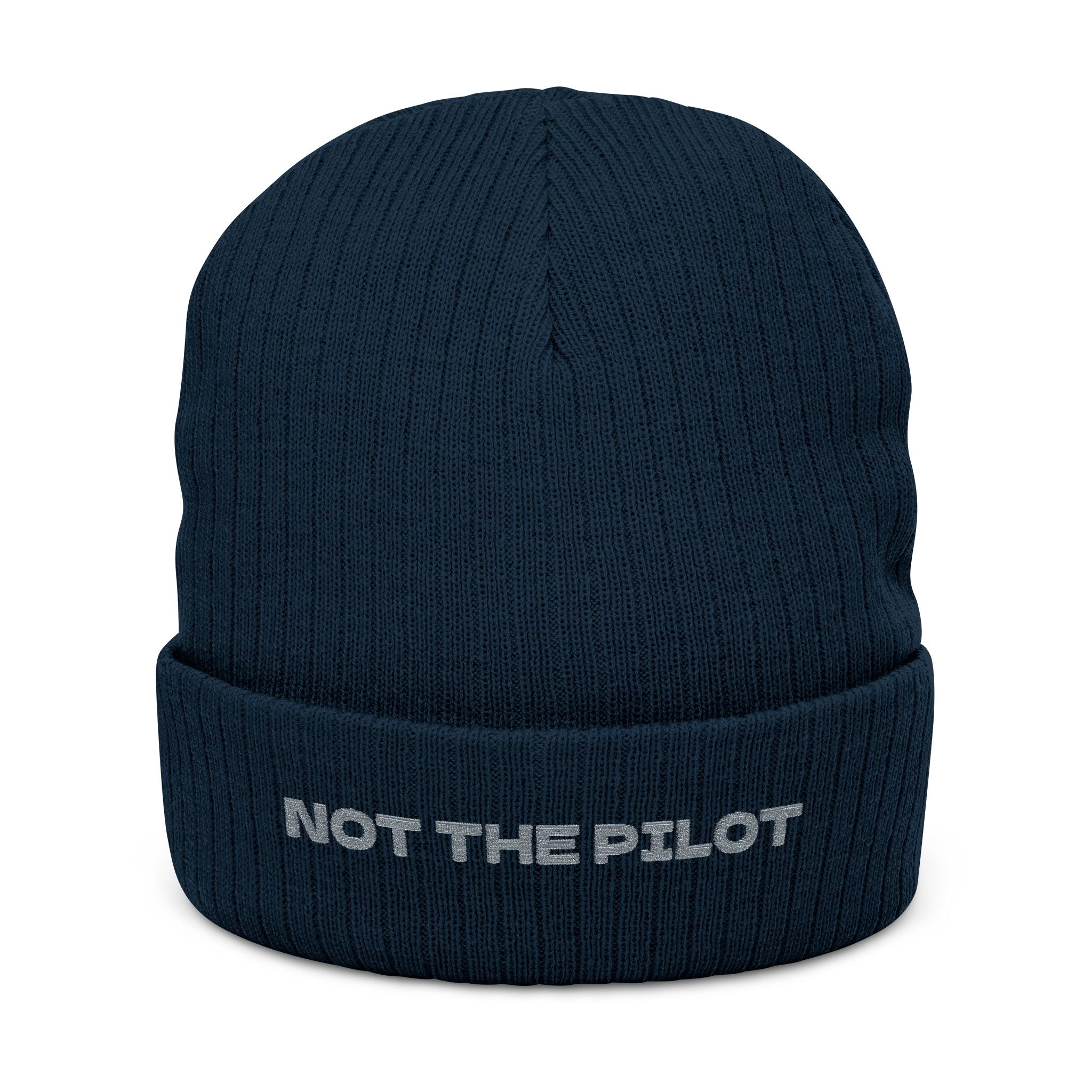 Navy blue beanie with 'NOT THE PILOT' text on a white background