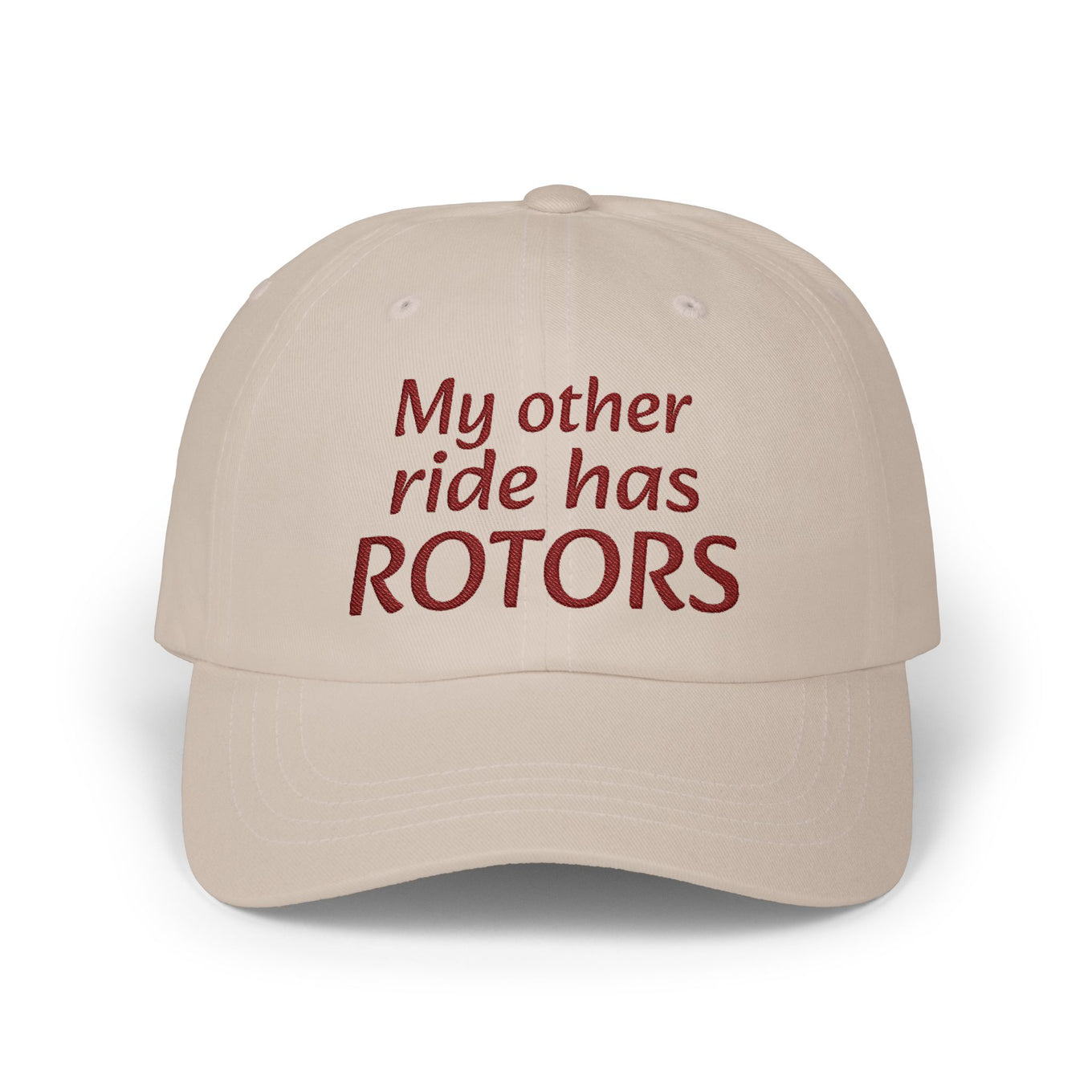 Beige cap with red text 'My other ride has ROTORS' on a white background