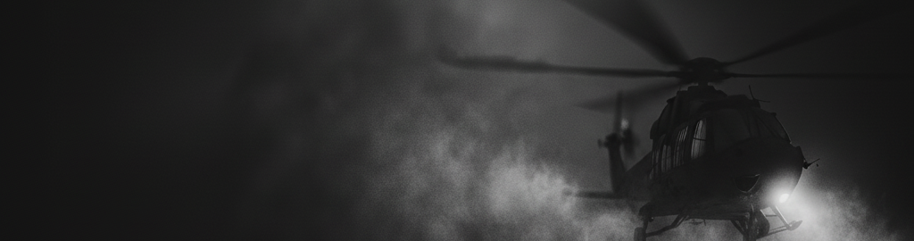 Helicopter silhouette in a dark sky with a light source