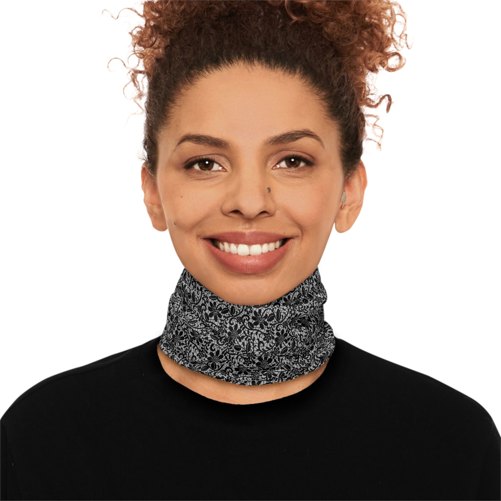 Person wearing a black and gray lace patterned neck gaiter by Rotor Wash & Wear