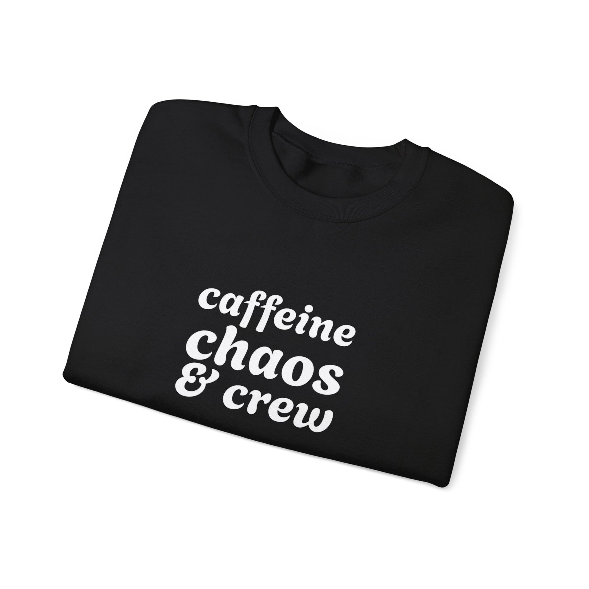 Folded black sweatshirt with 'caffeine chaos & crew' text on by Rotor Wash & Wear