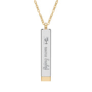 Silver and gold two-toned necklace with a cylindrical pendant engraved with 'flying mom' with hidden interior engraving "you're their hero" by Rotor Wash & Wear