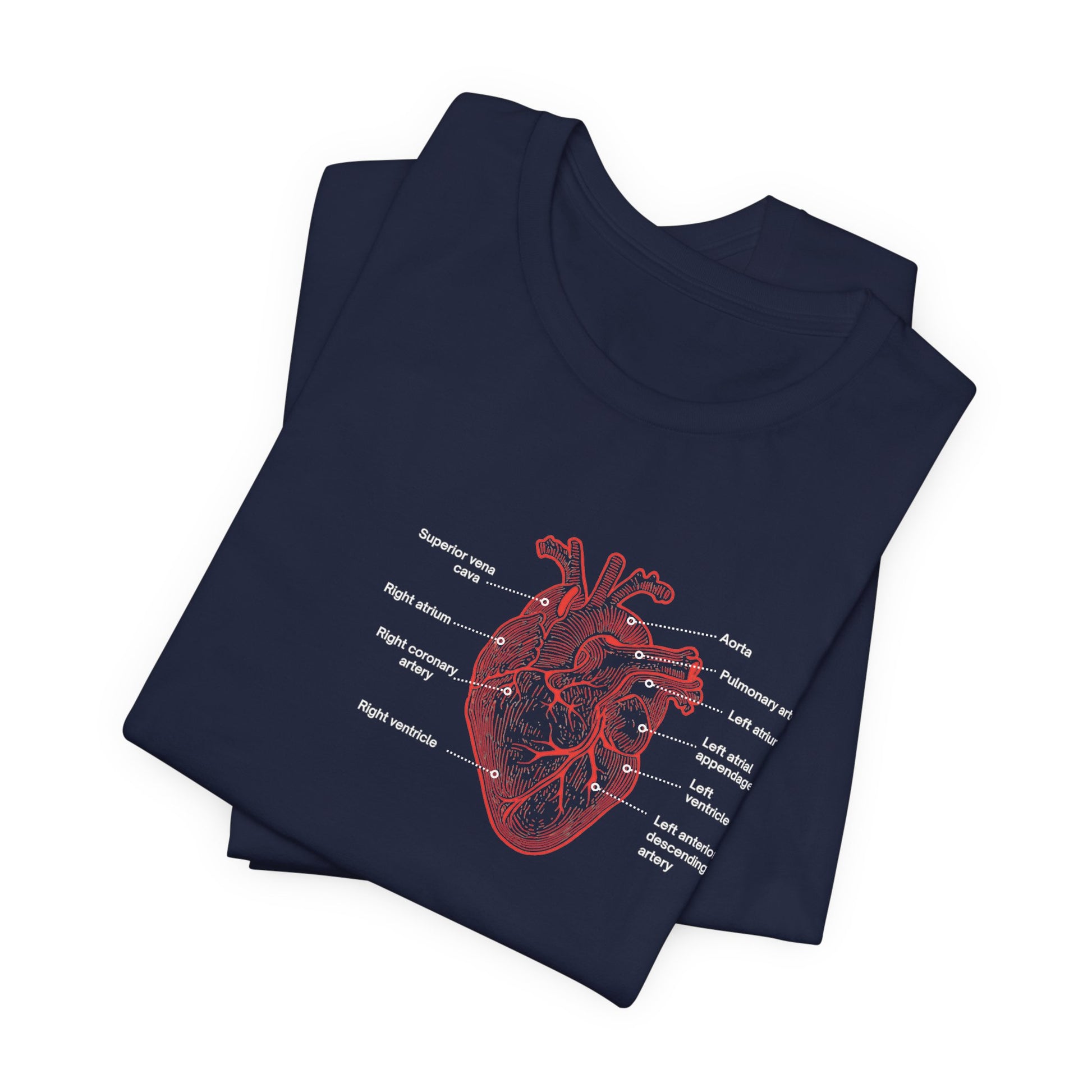 Folded navy t-shirt with a red anatomical heart design by Rotor Wash & Wear and EMS Avenger