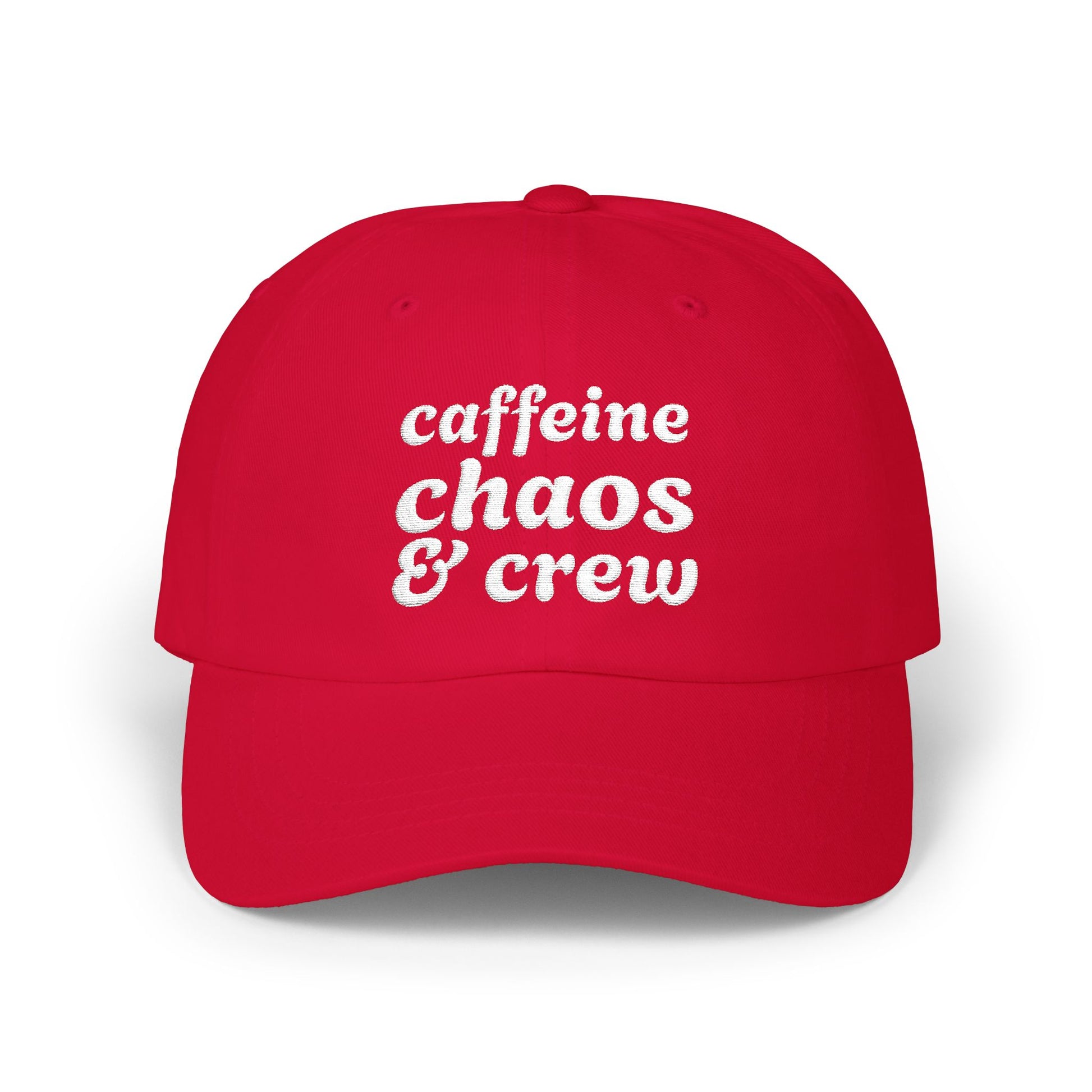Red cap with 'caffeine chaos & crew' text on a white background