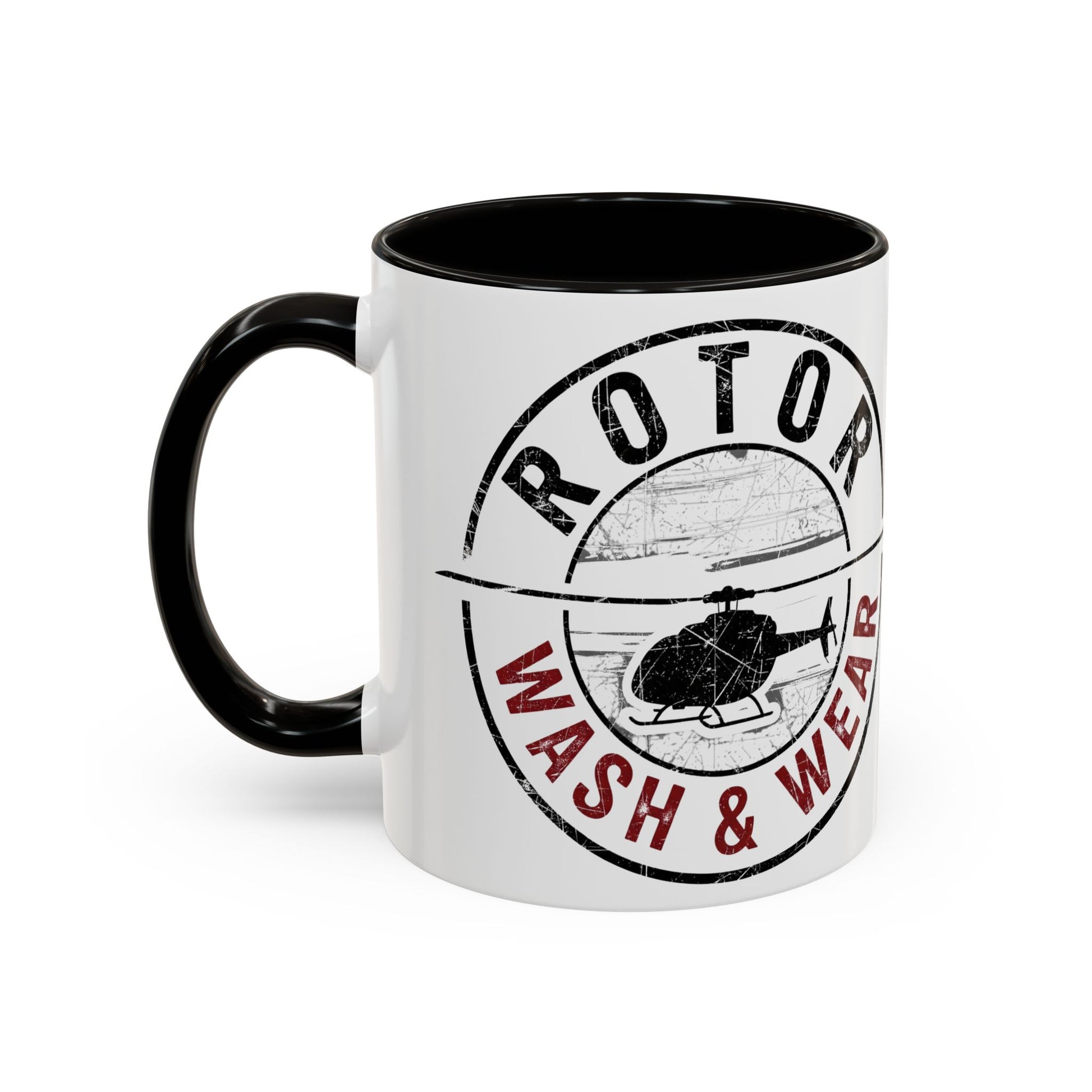 White mug with black interior and handle, featuring a helicopter graphic and text 'Rotor Wash & Wear' on a white background.