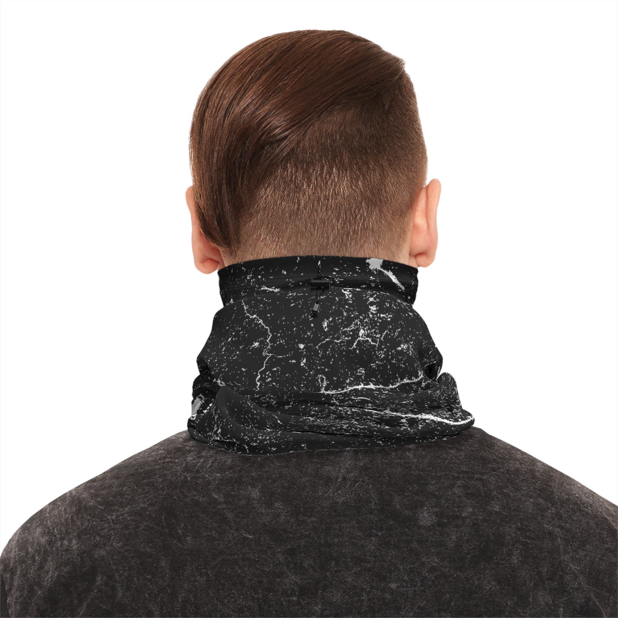 Person wearing black and white distressed patterned neck gaiter by Rotor Wash & Wear