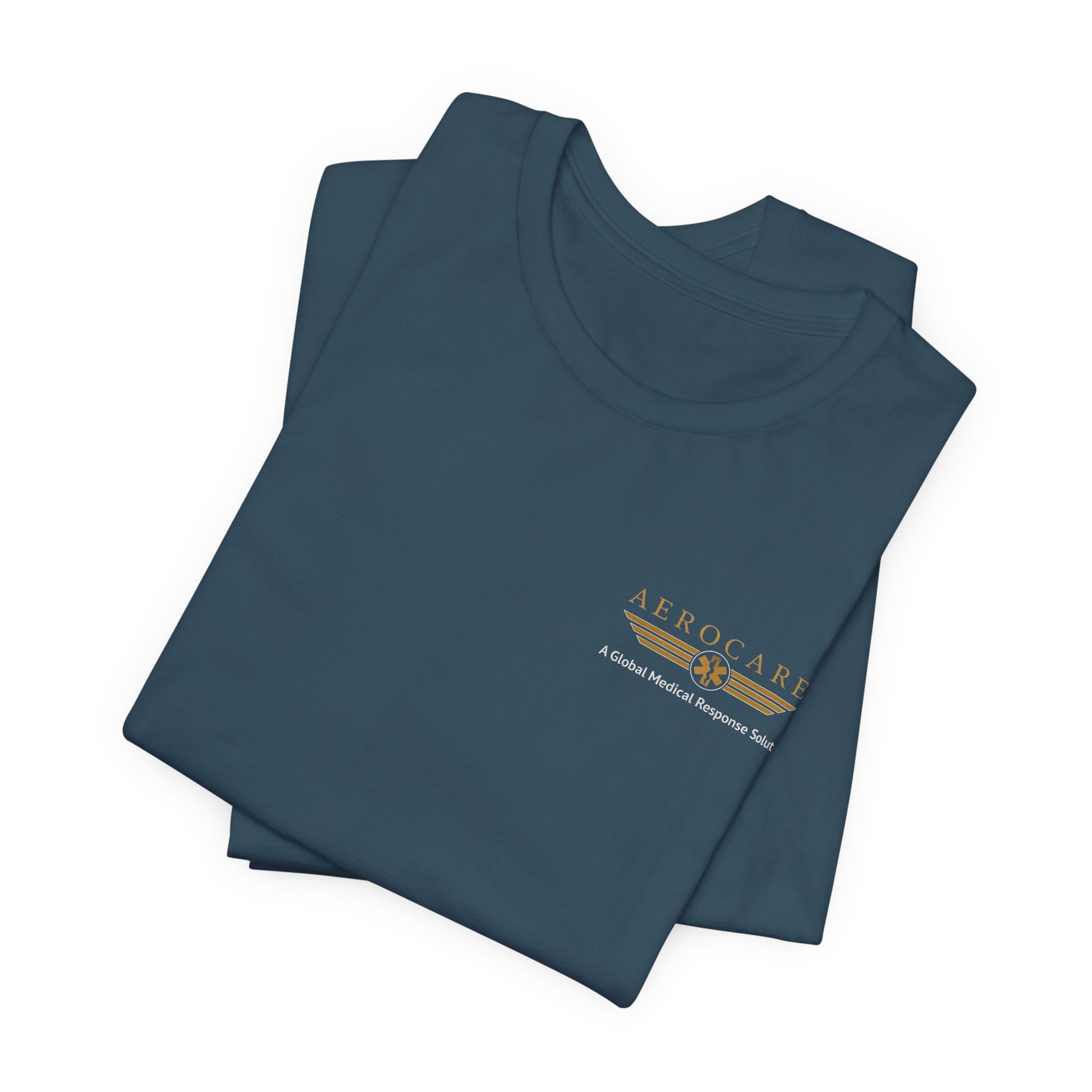 Folded blue t-shirt with Aerocare logo on a white background