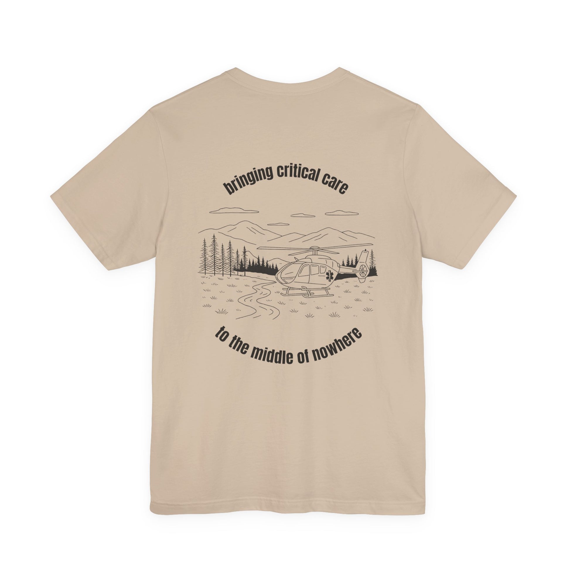 Beige t-shirt with a helicopter graphic and text "bringing critical care to the middle of nowhere" on the back, displayed on a white background.
