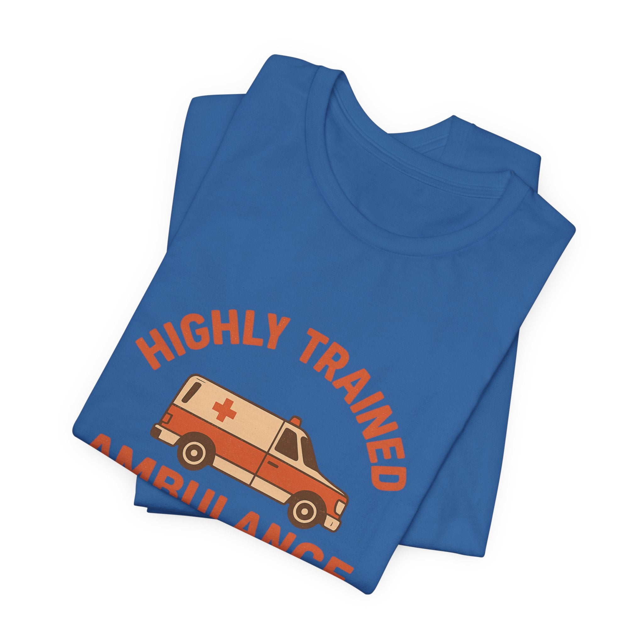 Folded blue t-shirt with 'Highly Trained ambulance driver' and ambulance graphic on a white background