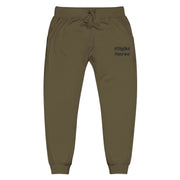 Olive green joggers with 'Flight Nurse' embroidered text on a white background