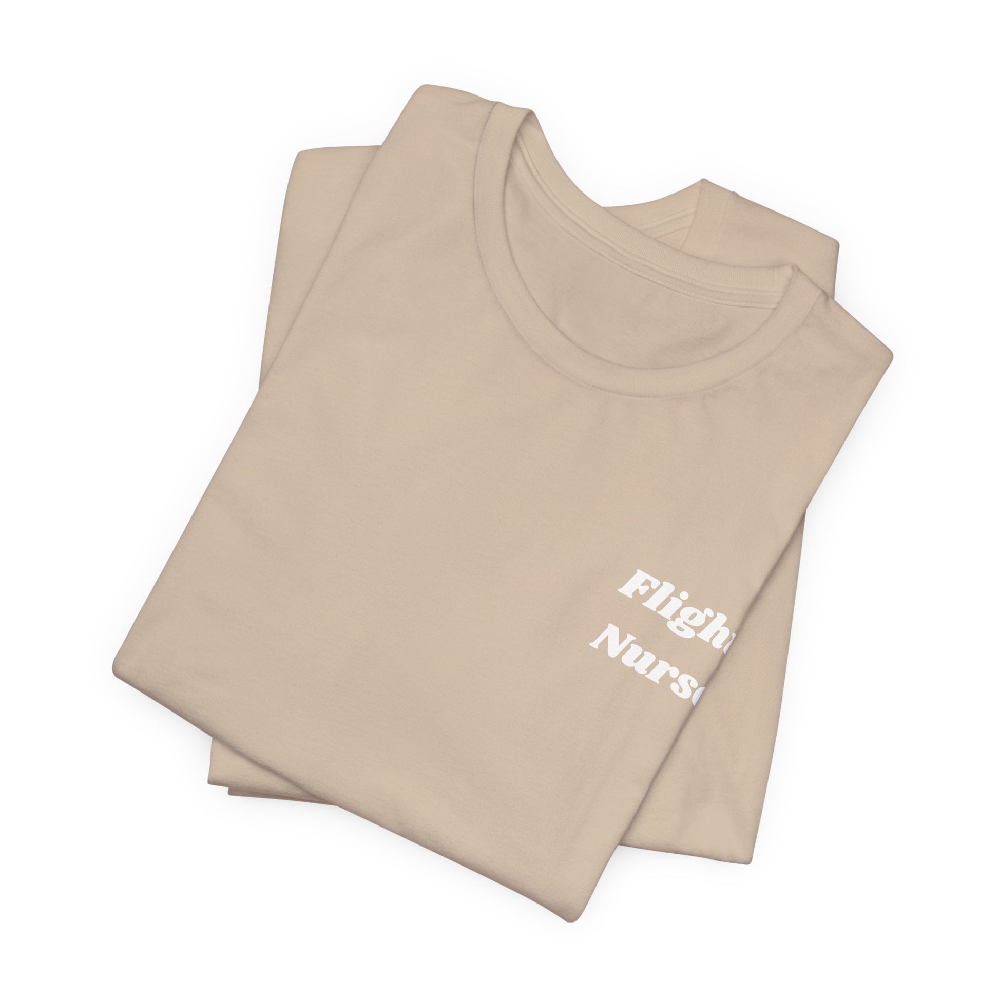 Beige t-shirt with 'Flight Nurse' text on a white background