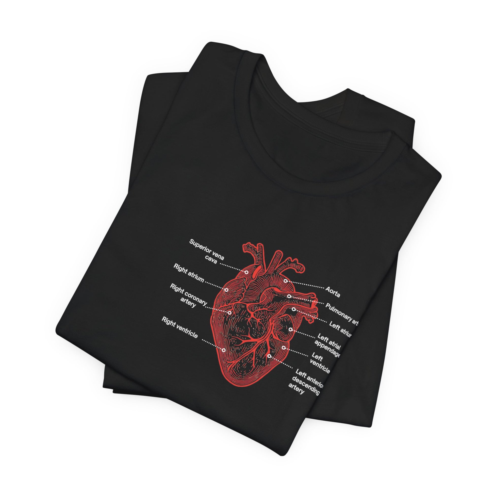 Folded black t-shirt with a red anatomical heart design by Rotor Wash & Wear and EMS Avenger