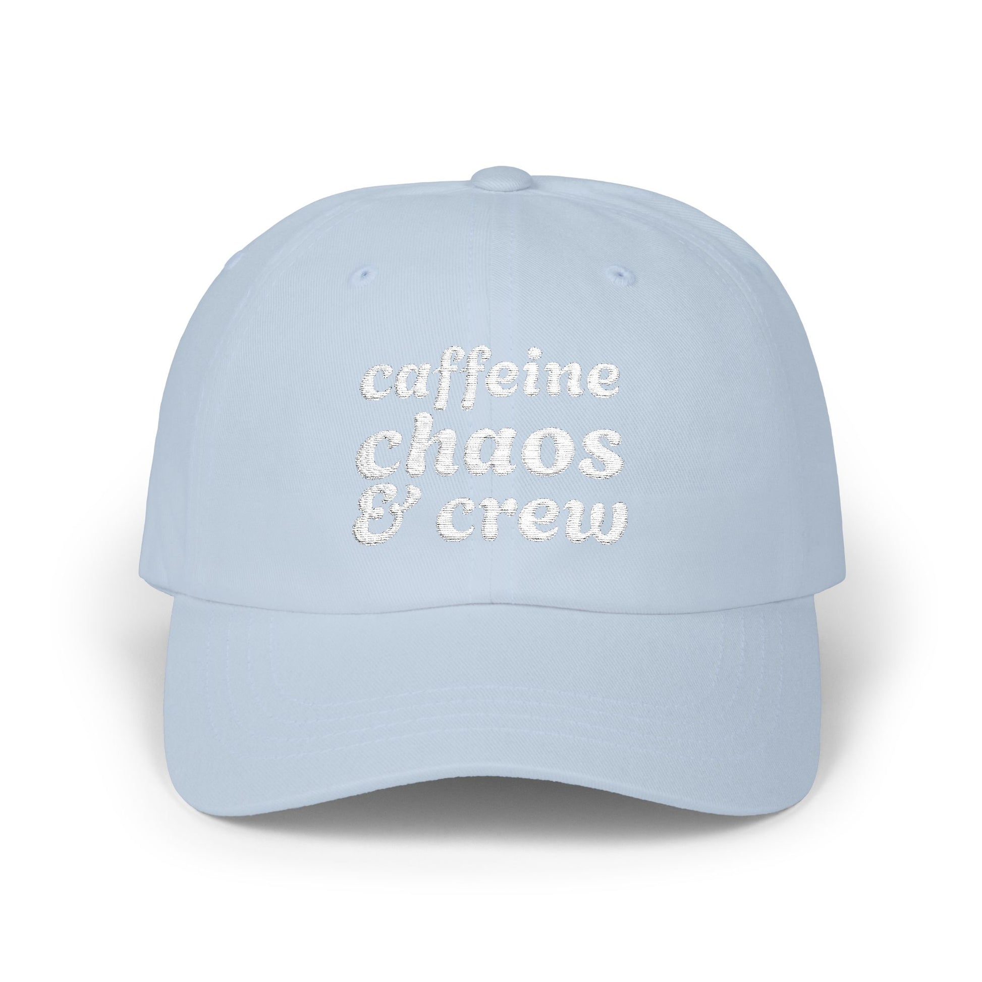 Light blue cap with 'cafeine chaos & crew' text on a white background