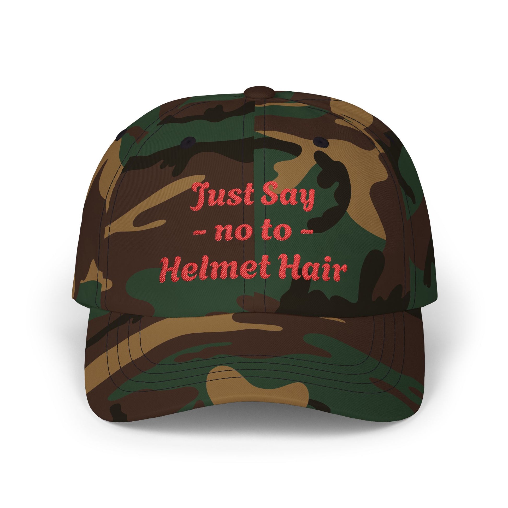 Camouflage cap with red text 'Just Say no to Helmet Hair' on a white background