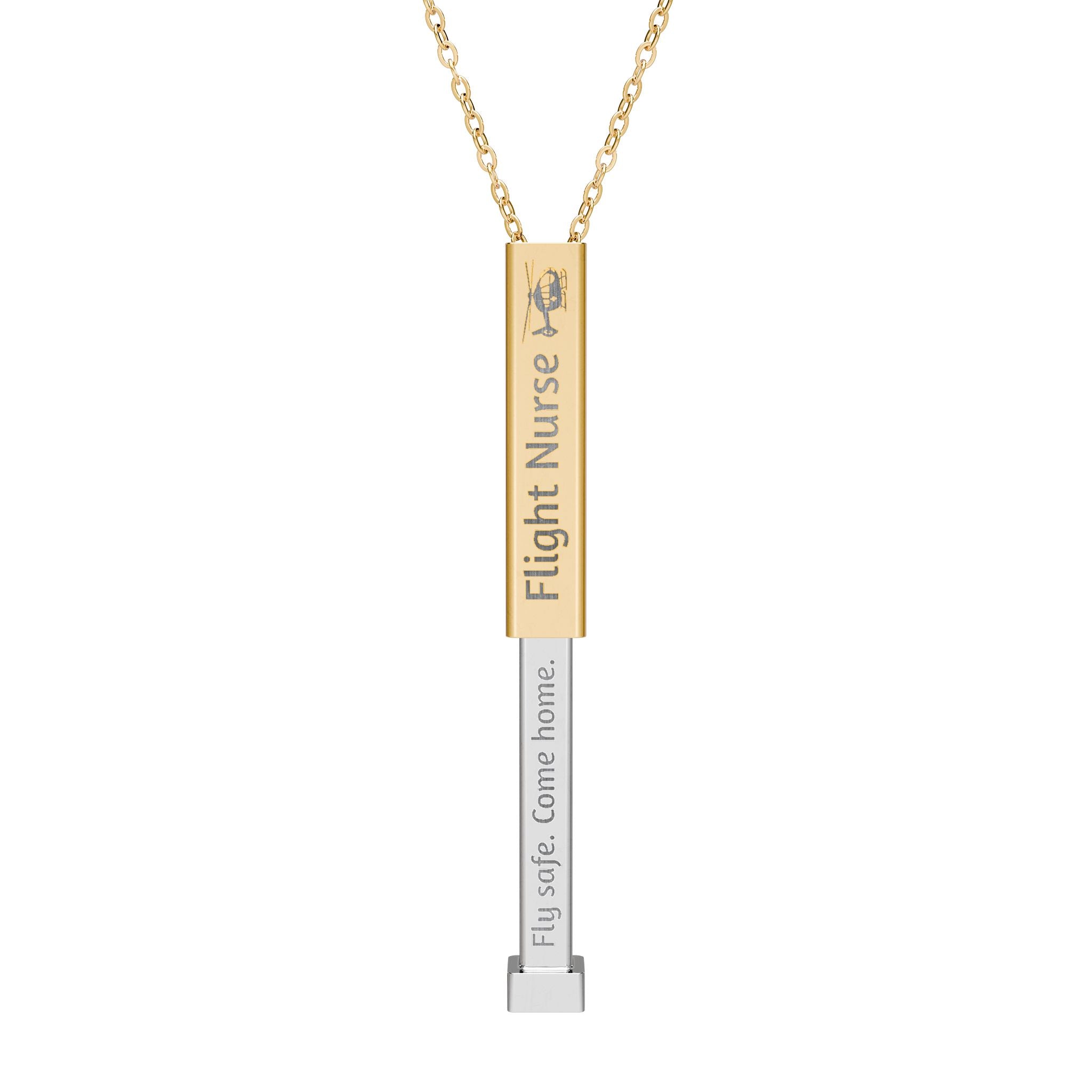 Silver and gold two-toned necklace with a cylindrical pendant engraved with 'flight nurse' with hidden interior engraving "Fly Safe. Come home." by Rotor Wash & Wear