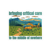 Sticker with a helicopter design and text 'bringing critical care to the middle of nowhere' on a white background