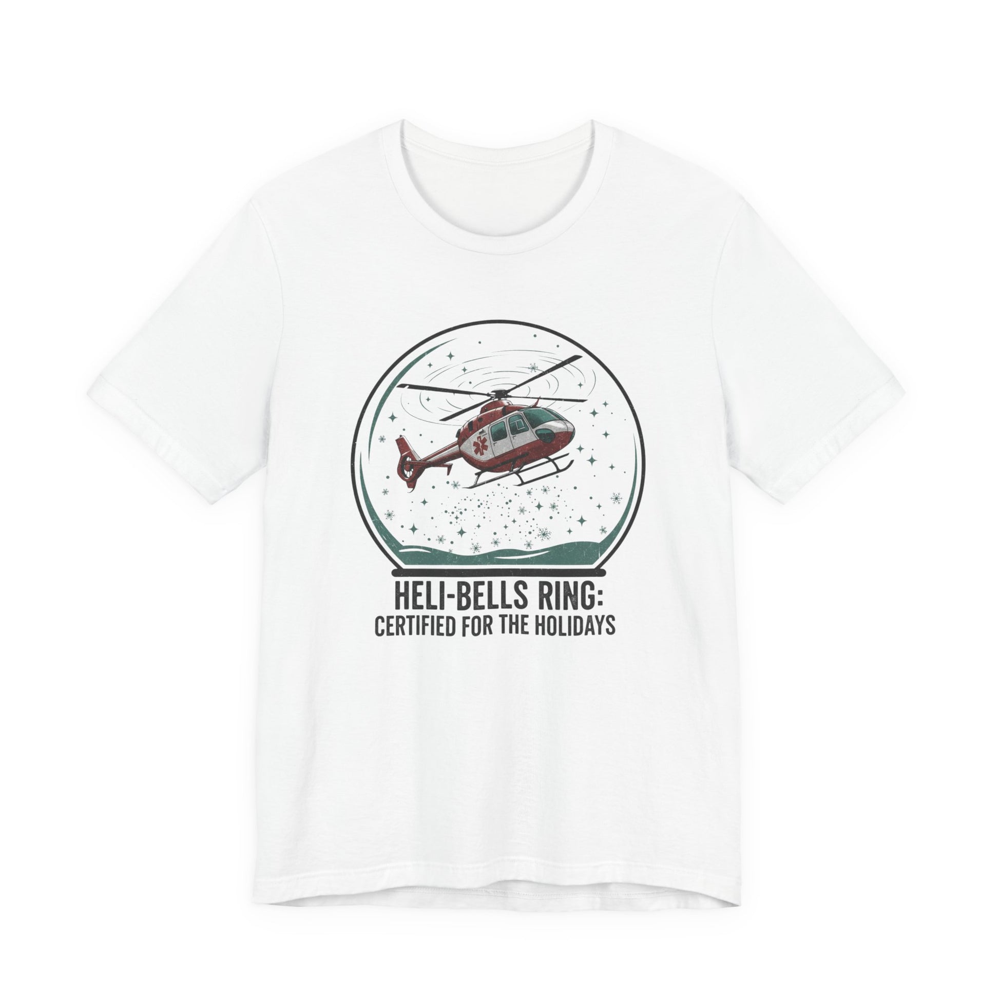White t-shirt with a graphic of a helicopter in a snow globe and text "Heli-bells ring: certified for the holidays" by Rotor Wash & Wear