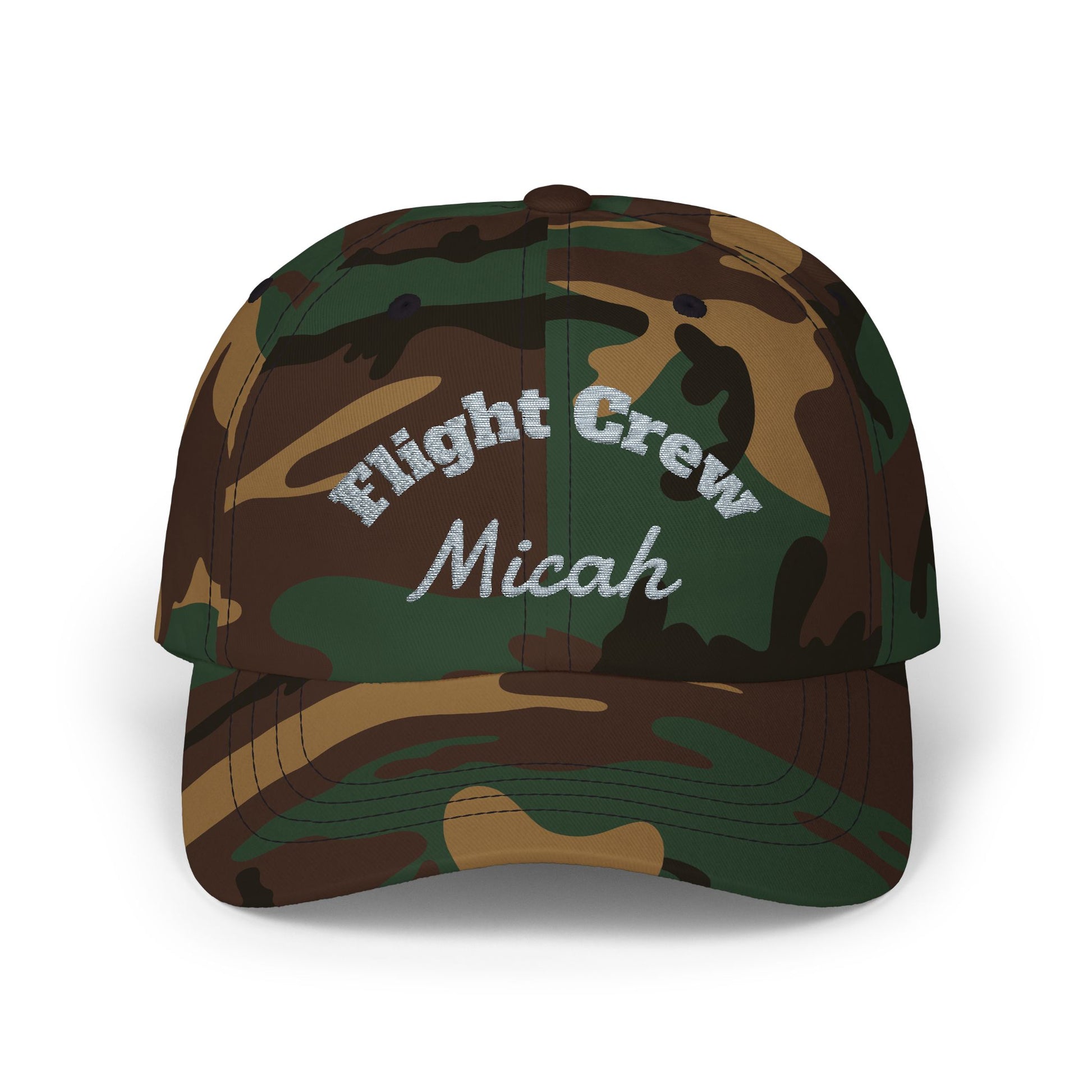 Camouflage cap with 'Flight Crew Micah' text on a white background