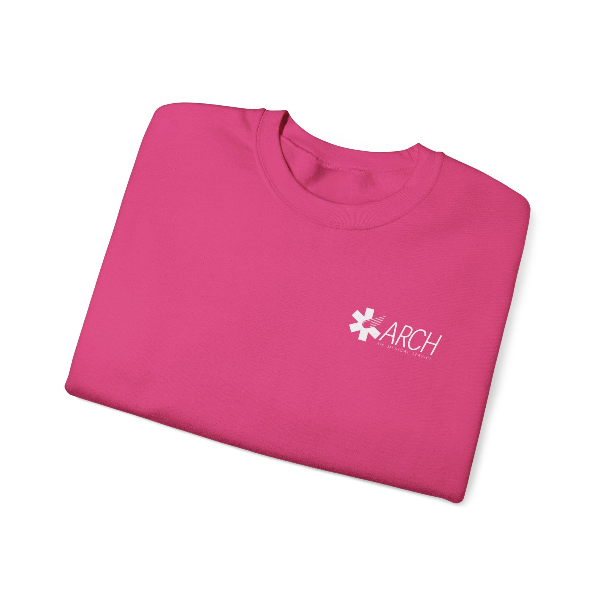 Folded pink crewneck sweatshirt with a small ARCH by Air Methods logo on the left chest by Rotor Wash & Wear