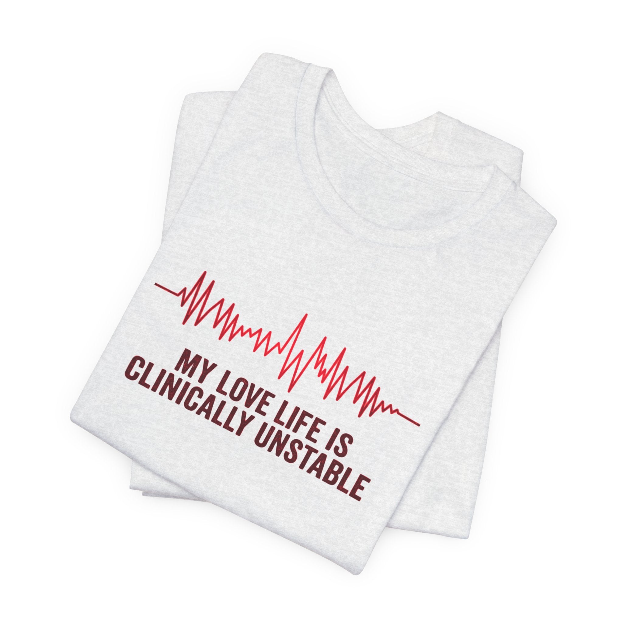 Folded ash gray t-shirt ventricular fibrillation cardiac rhythm and text "My love life is clinically unstable" by Rotor Wash & Wear