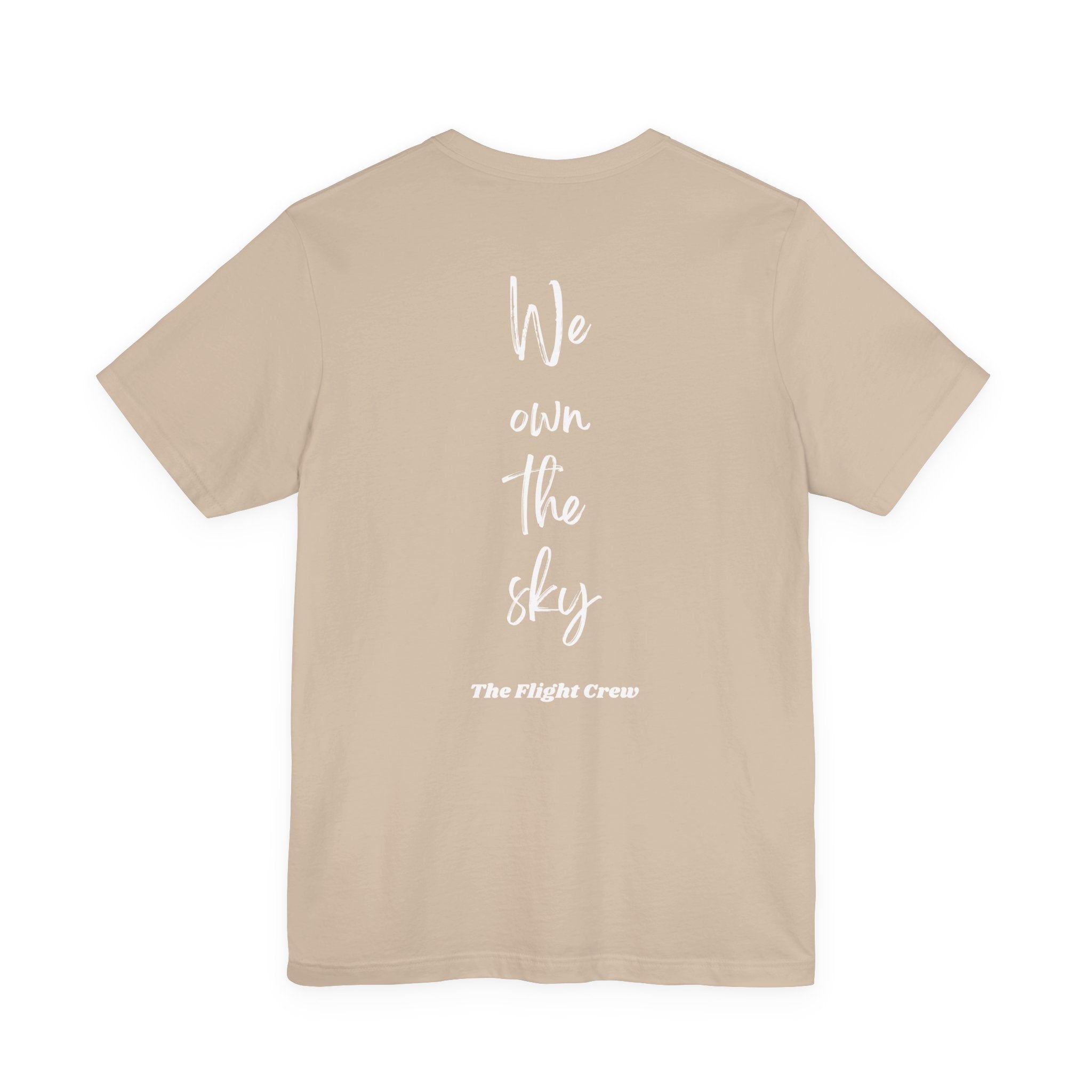 Tan t-shirt with 'We own the sky, The Flight Crew' text on the back against a white background