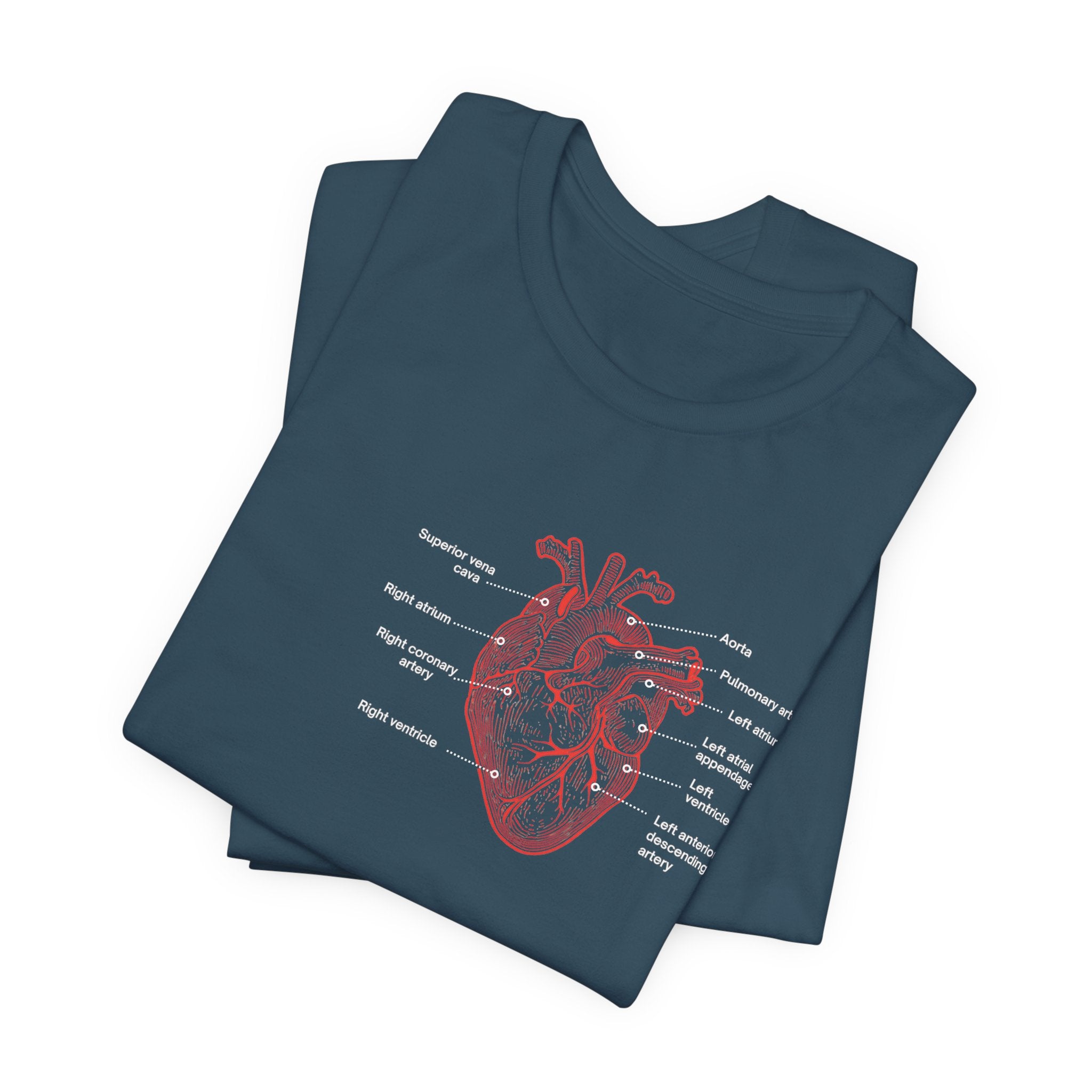 Folded deep teal t-shirt with a red anatomical heart design by Rotor Wash & Wear and EMS Avenger