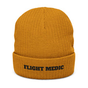 Mustard yellow beanie with 'FLIGHT MEDIC' text on a white background