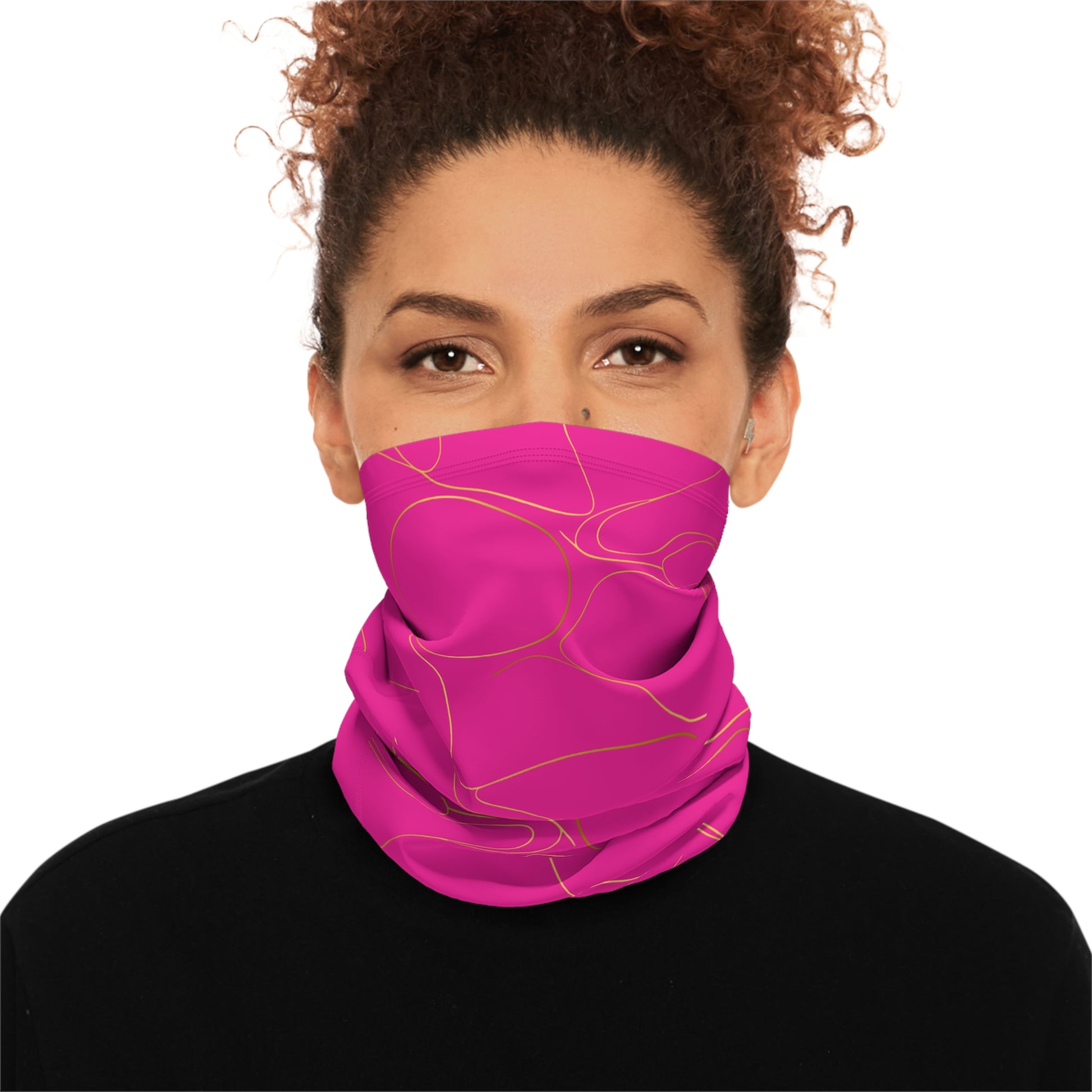 Person wearing a hot pink neck gaiter with gold piping pattern by Rotor Wash & Wear