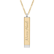 Silver and gold two-toned necklace with a cylindrical pendant customizable outer and hidden interior engraving by Rotor Wash & Wear