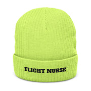 Green beanie with 'FLIGHT NURSE' text on a white background