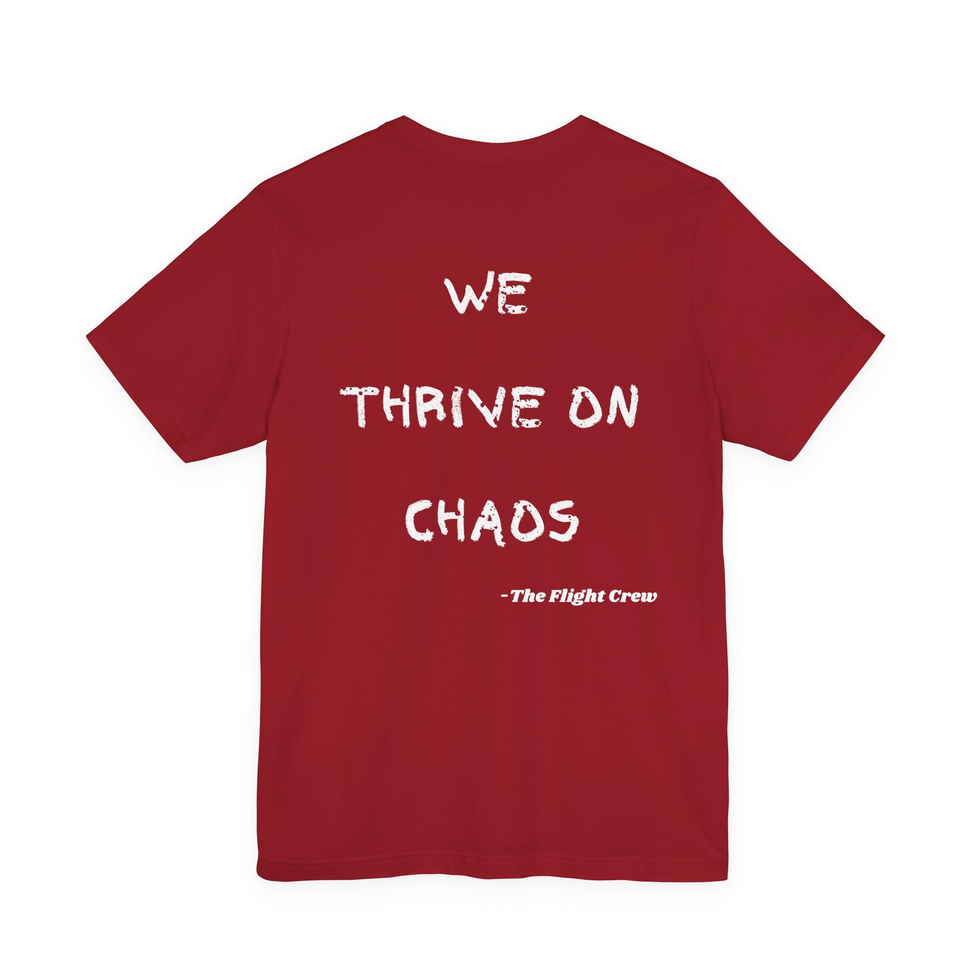 Red t-shirt with white text 'WE THRIVE ON CHAOS' and '-The Flight Crew-' on a white background