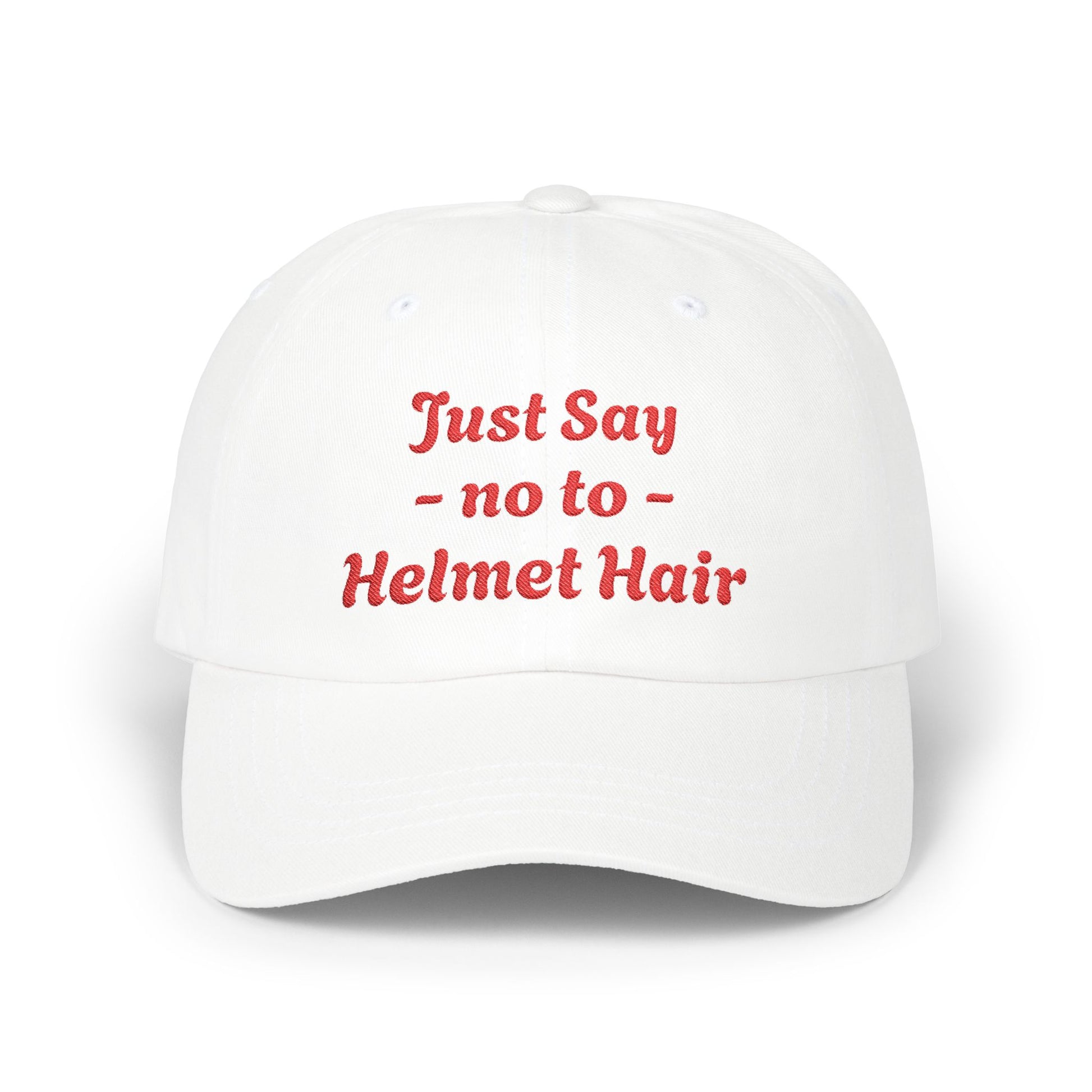 White cap with red text 'Just Say no to Helmet Hair' on a white background