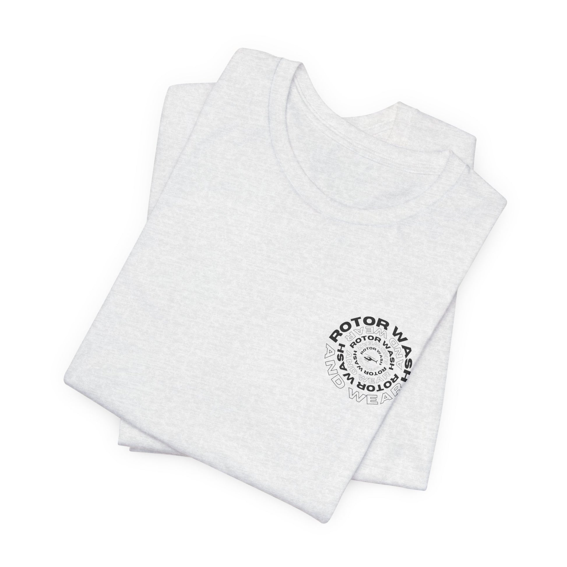 Folded white t-shirt with 'Rotor Wash and Wear' circular design text design on the left chest on a white background