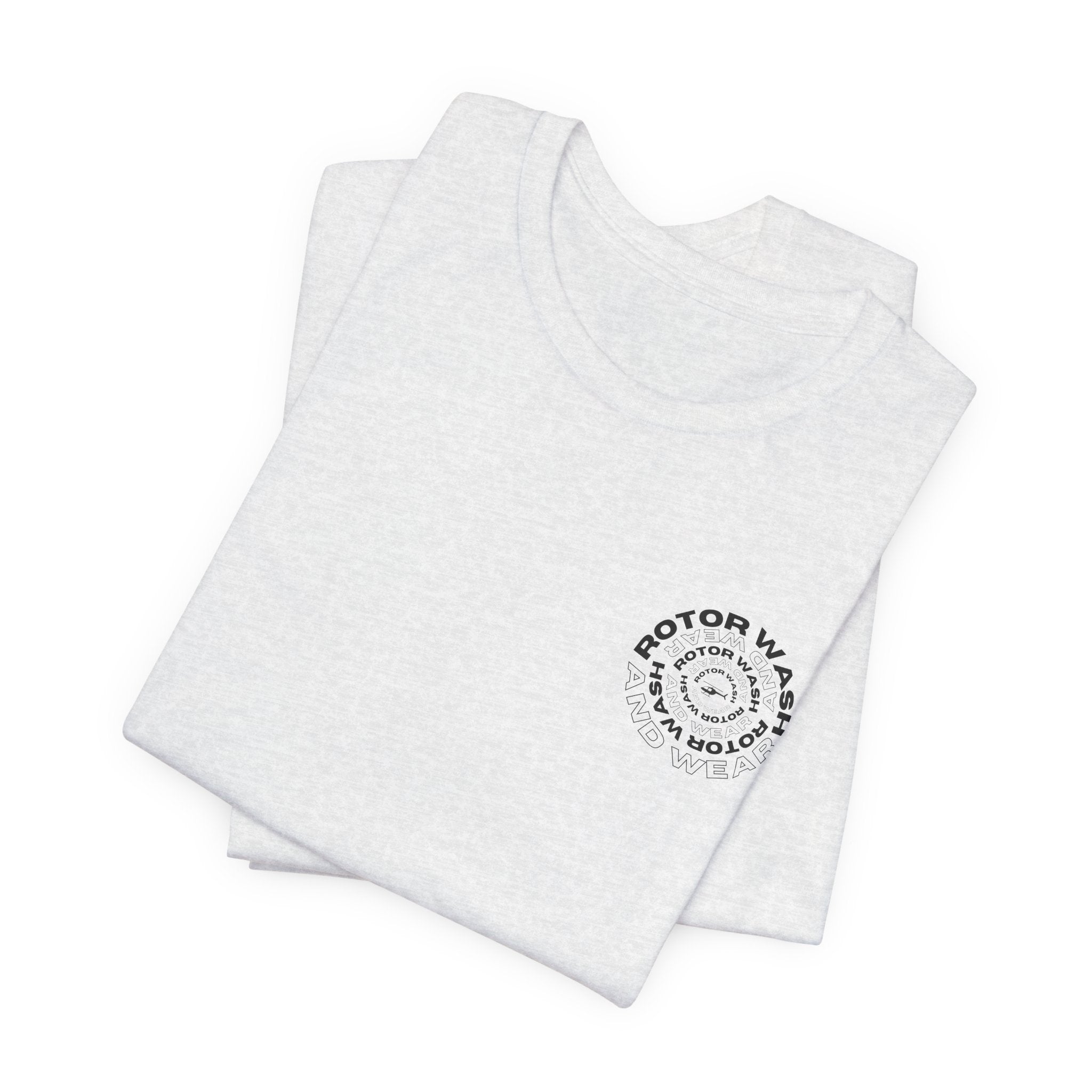 Folded white t-shirt with 'Rotor Wash and Wear' circular design text design on the left chest on a white background