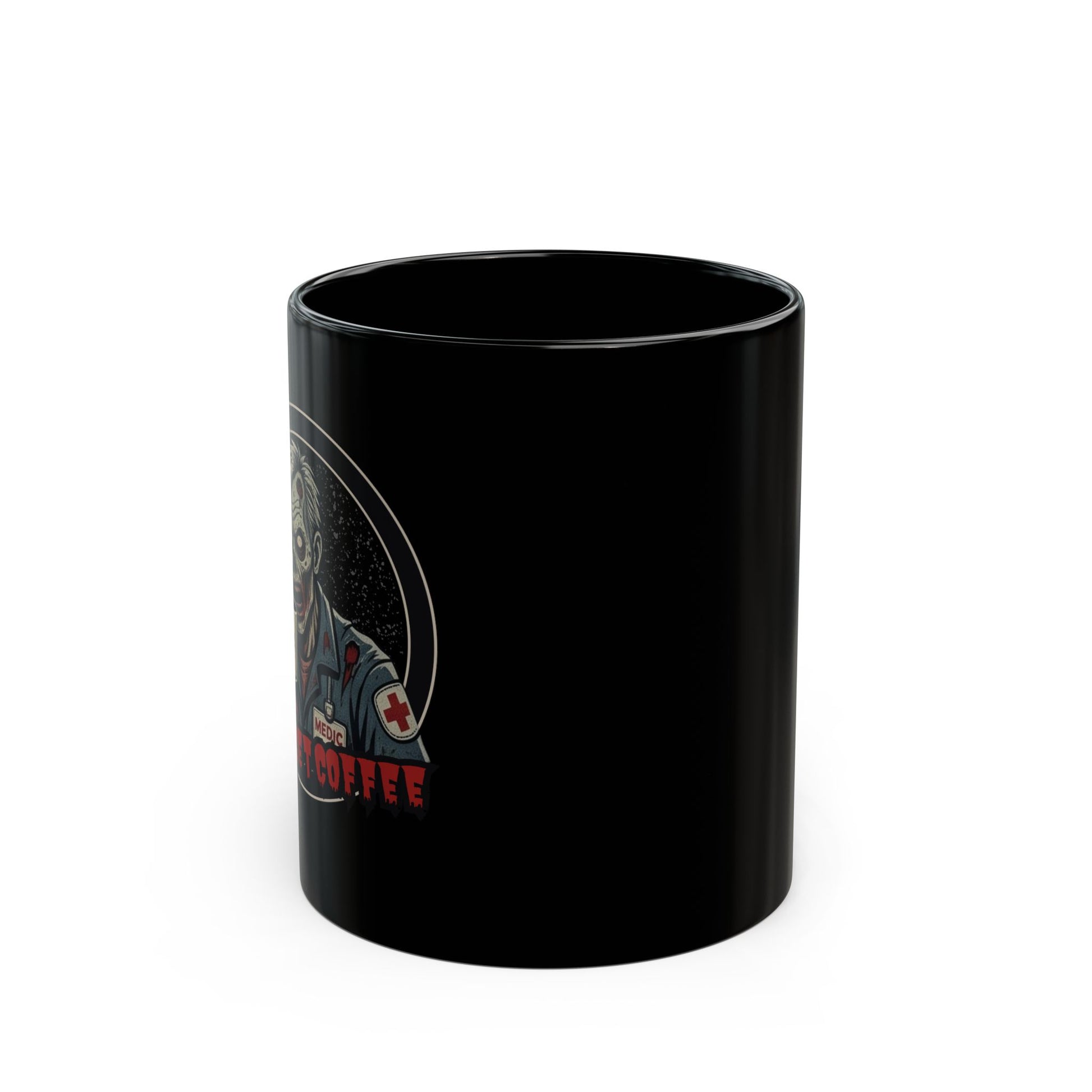 A black ceramic coffee mug featuring a zombie medic graphic holding a coffee mug, with the text 'MUST GET COFFEE' in red below by Rotor Wash & Wear