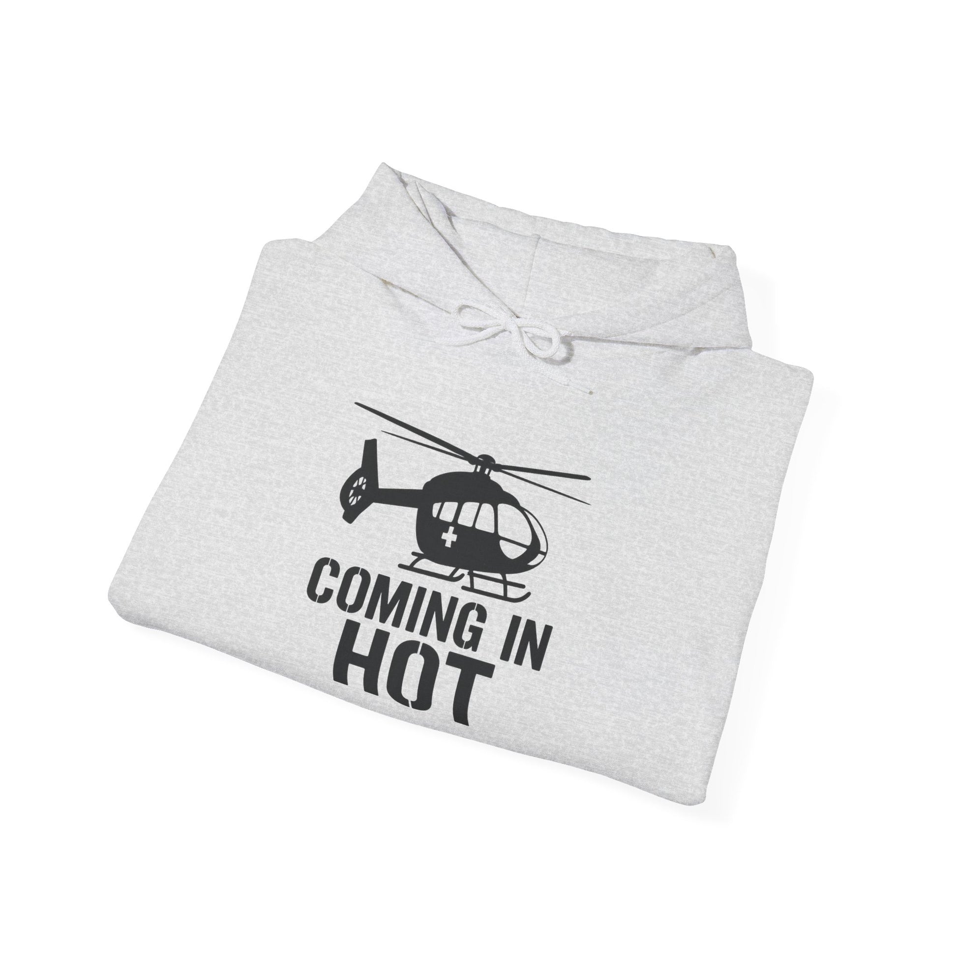 Folded gray hoodie with helicopter graphic and text on a white background