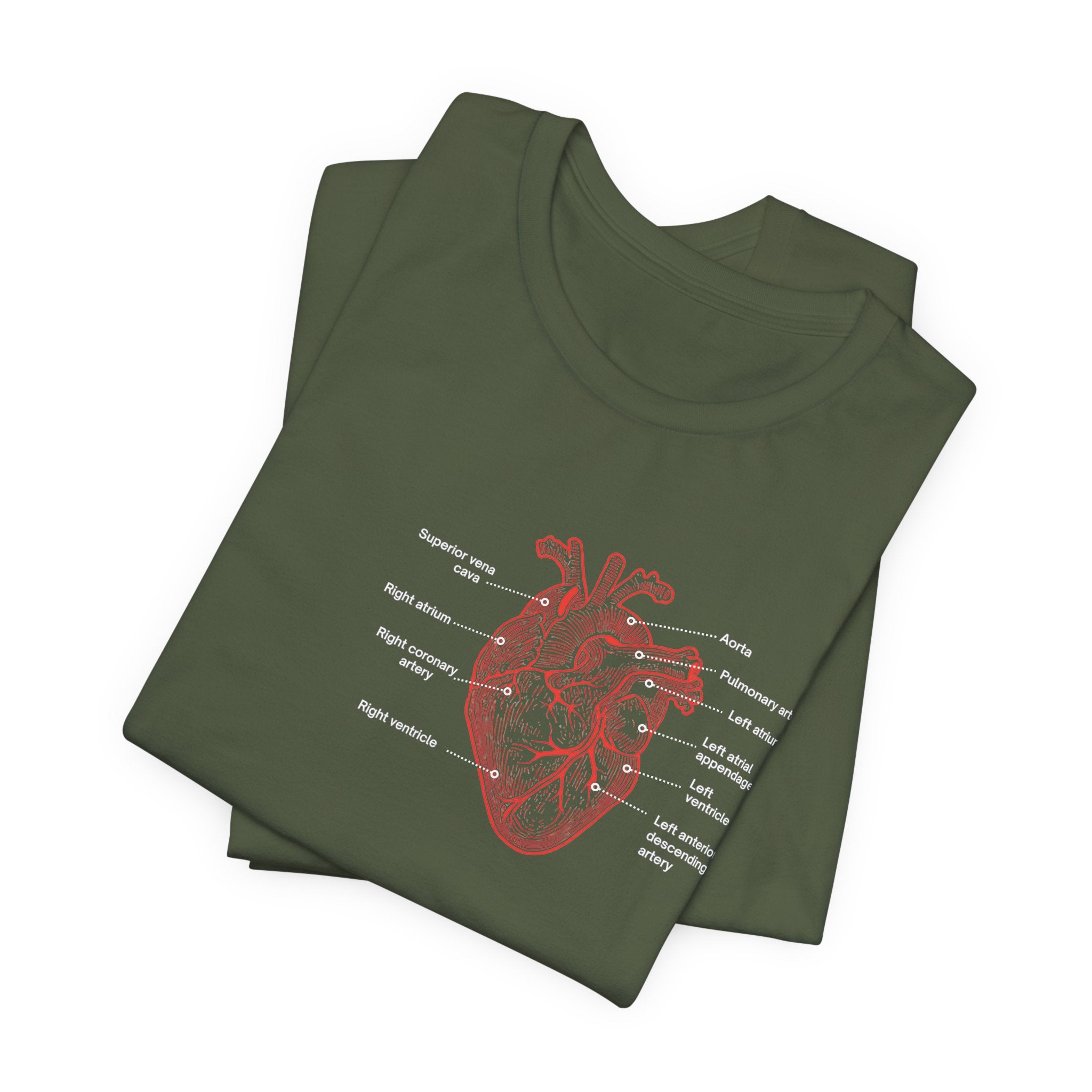 Folded green t-shirt with a red anatomical heart design by Rotor Wash & Wear and EMS Avenger