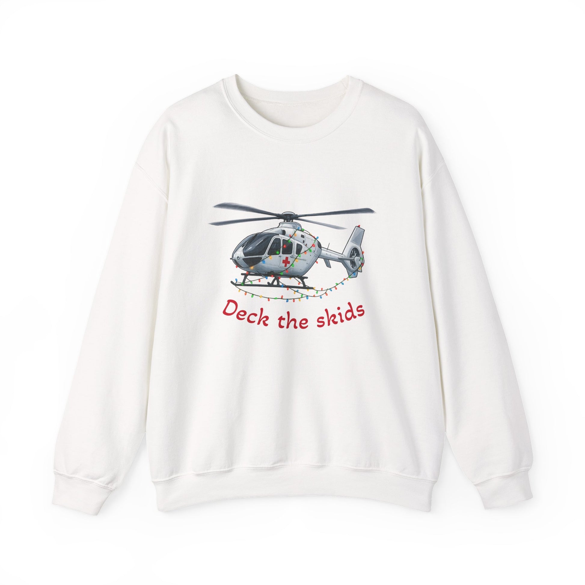 White sweatshirt with a medical helicopter graphic wrapped in Christmas lights and text "deck the skids" by Rotor Wash & Wear