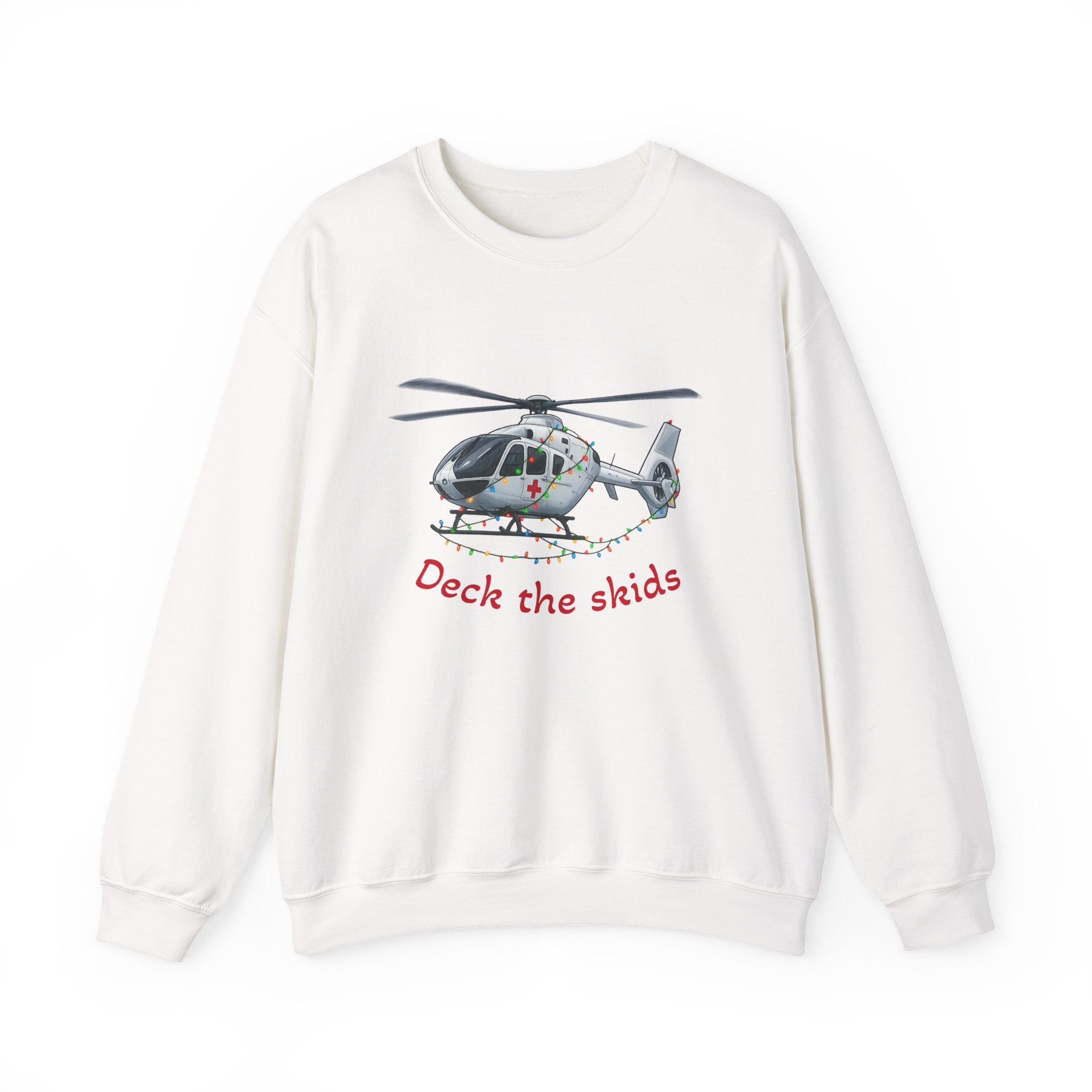 White sweatshirt with a medical helicopter graphic wrapped in Christmas lights and text "deck the skids" by Rotor Wash & Wear