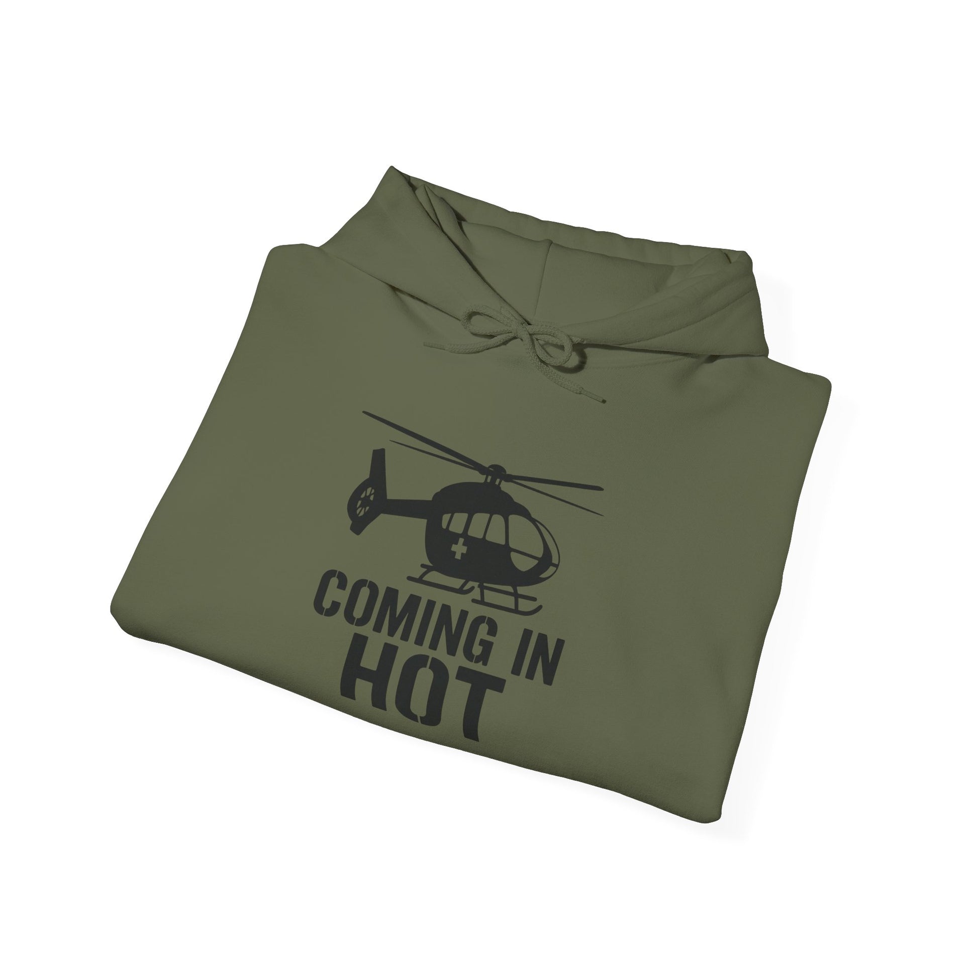 Folded green hoodie with helicopter graphic and text on a white background