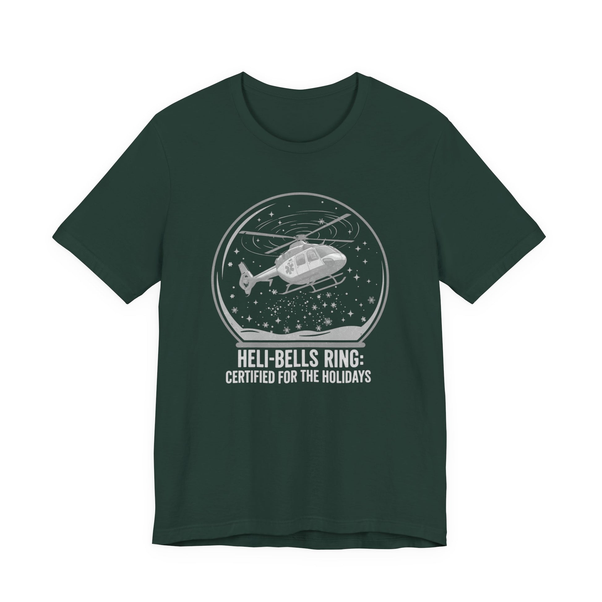 Green t-shirt with a graphic of a helicopter in a snow globe and text "Heli-bells ring: certified for the holidays" by Rotor Wash & Wear