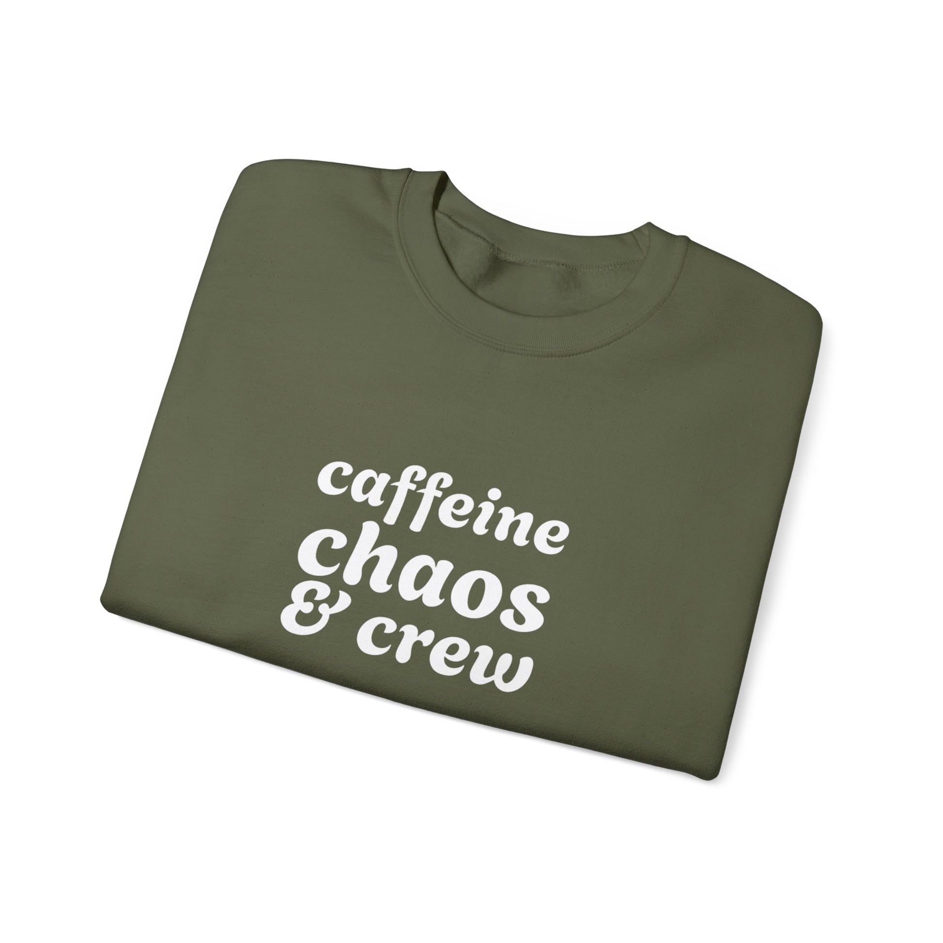 Folded green sweatshirt with 'caffeine chaos & crew' text on by Rotor Wash & Wear