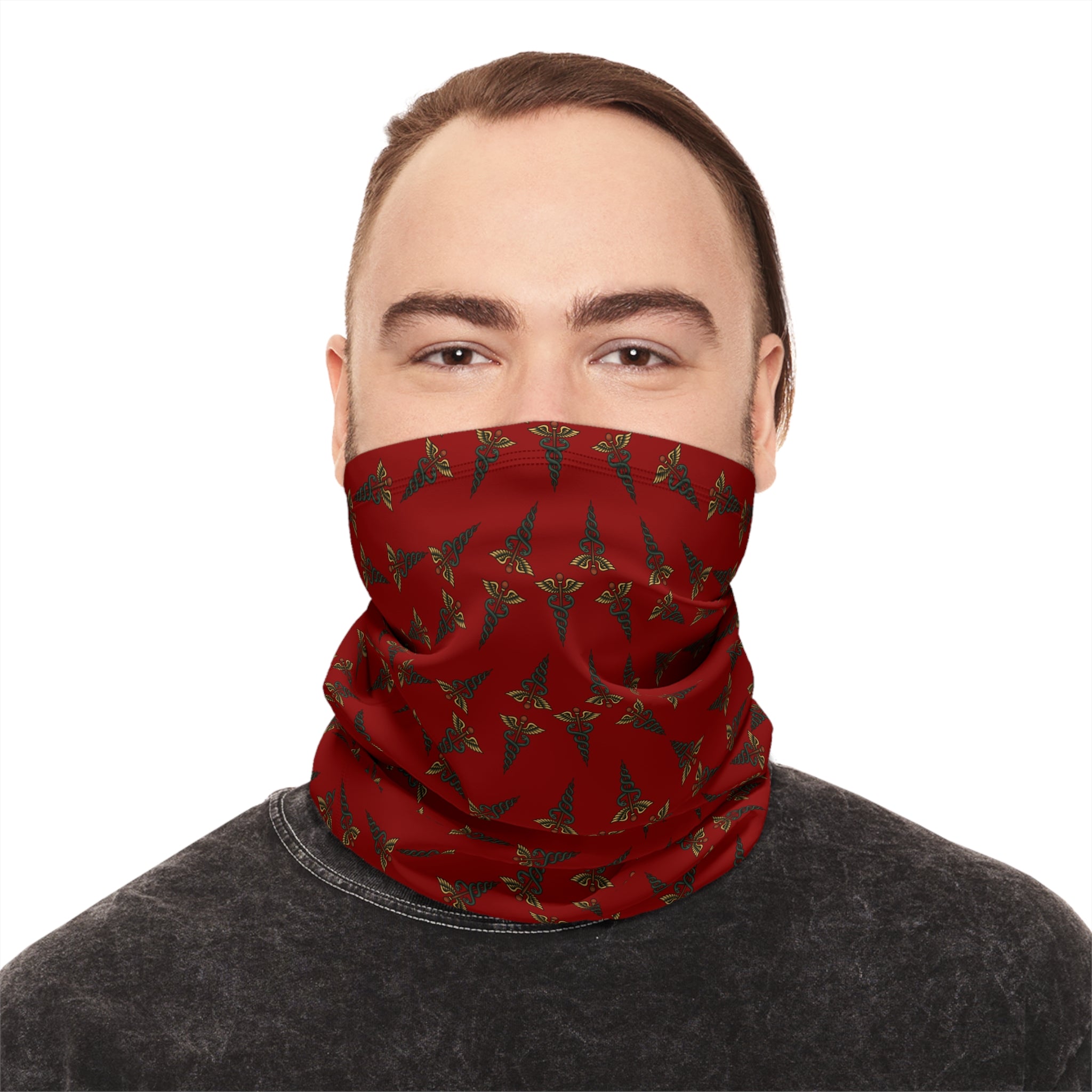 Man wearing a red caduceus patterned neck gaiter by Rotor Wash & Wear