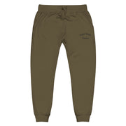 Olive green joggers with text "Flight Medic Sanchez" on a white background