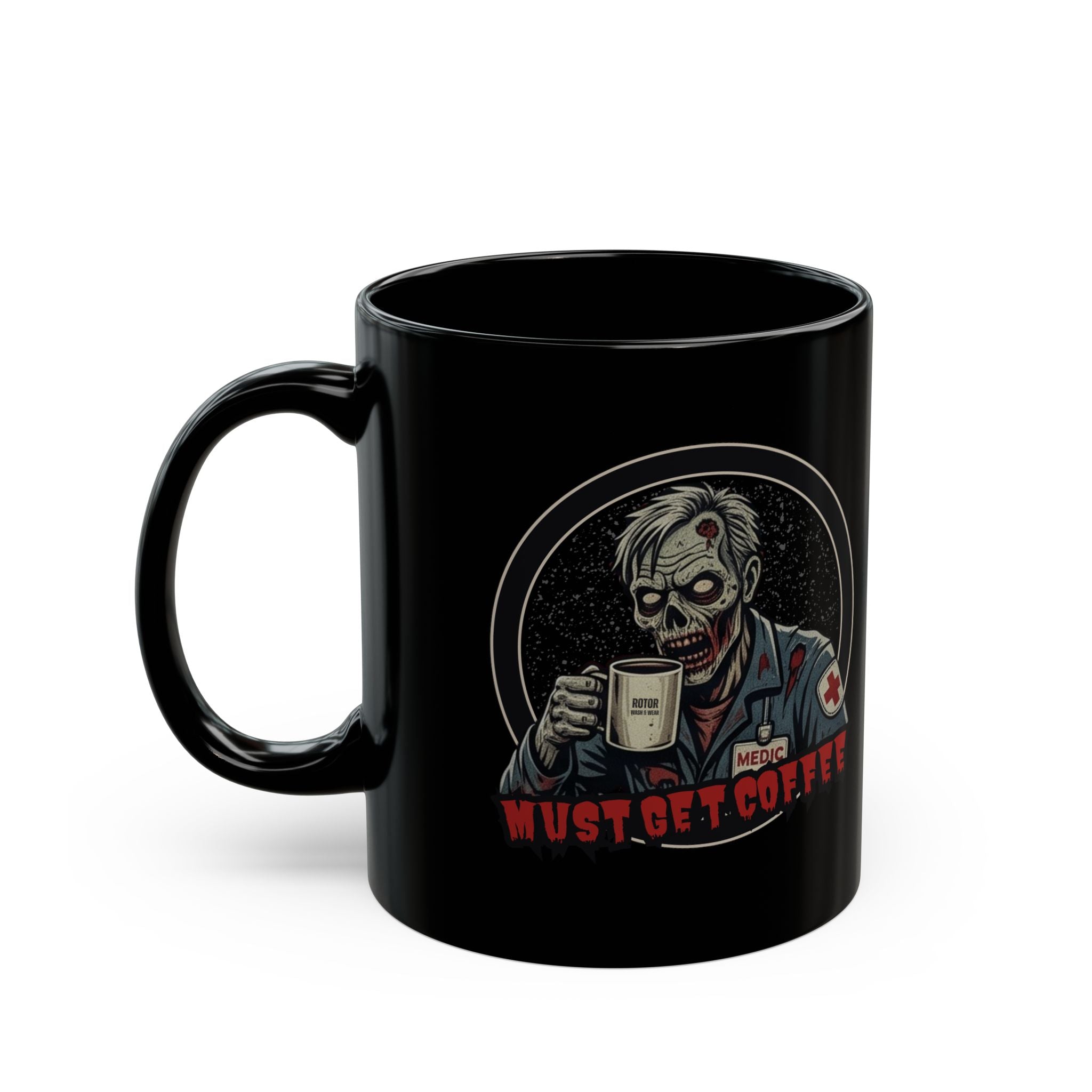 A black ceramic coffee mug featuring a zombie medic graphic holding a coffee mug, with the text 'MUST GET COFFEE' in red below by Rotor Wash & Wear