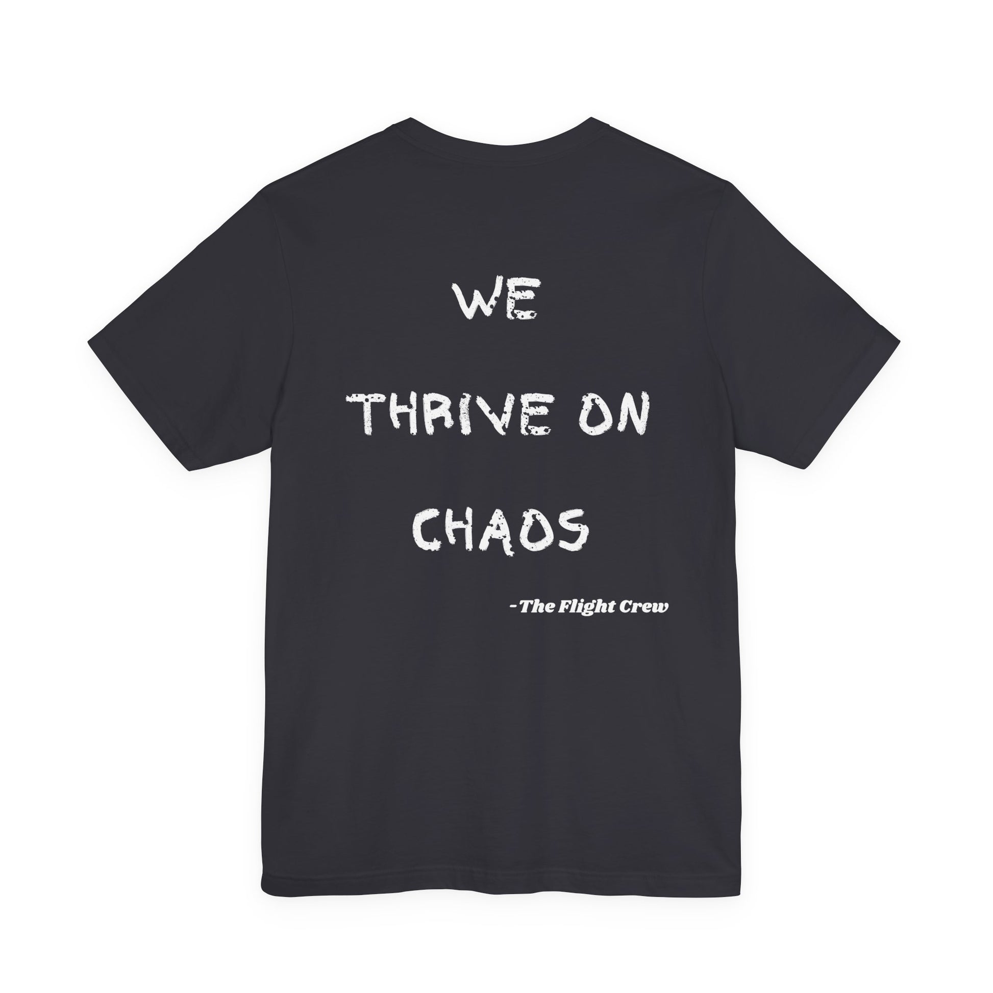 Dark gray t-shirt with white text 'WE THRIVE ON CHAOS' and '-The Flight Crew-' on a white background