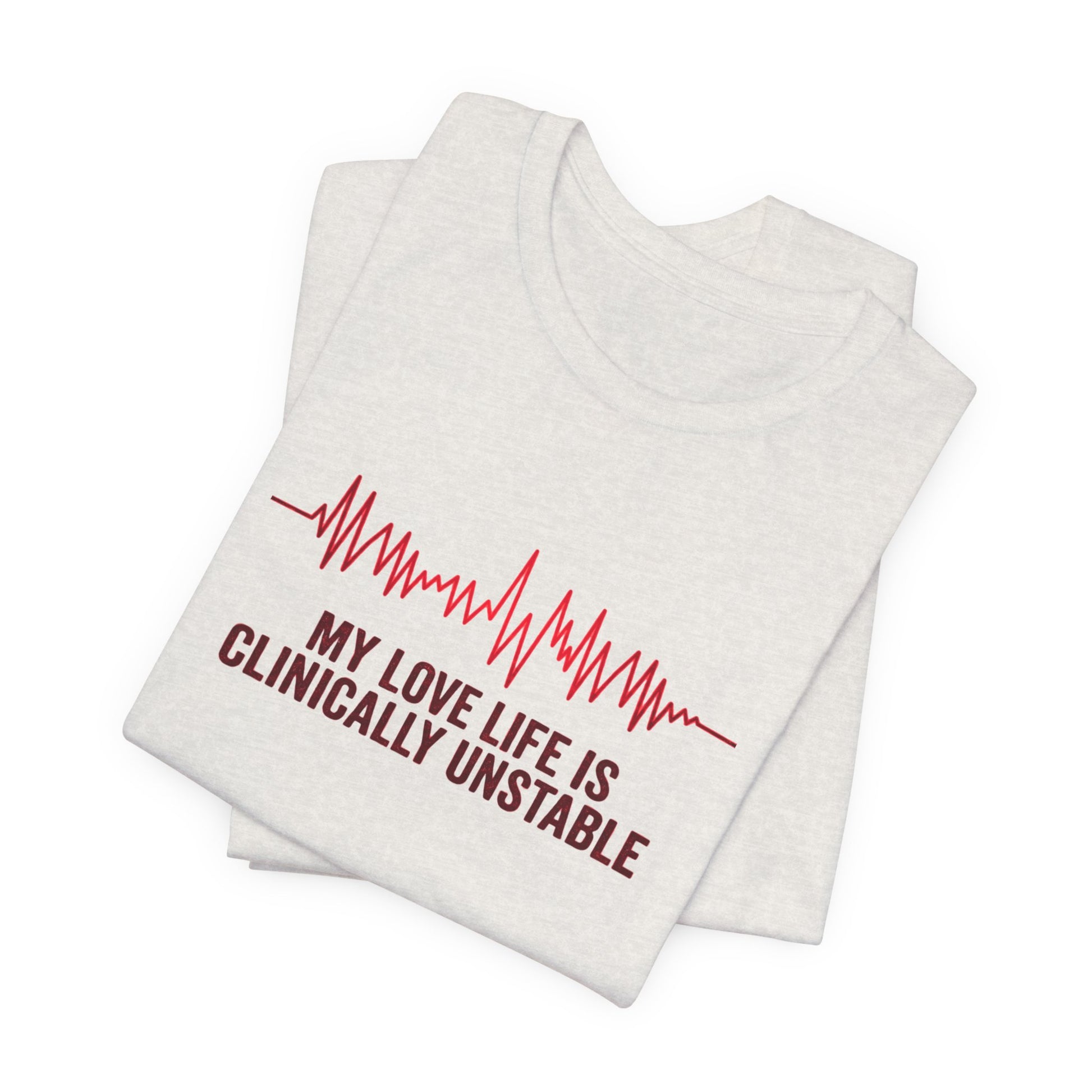 Folded heather cement t-shirt ventricular fibrillation cardiac rhythm and text "My love life is clinically unstable" by Rotor Wash & Wear