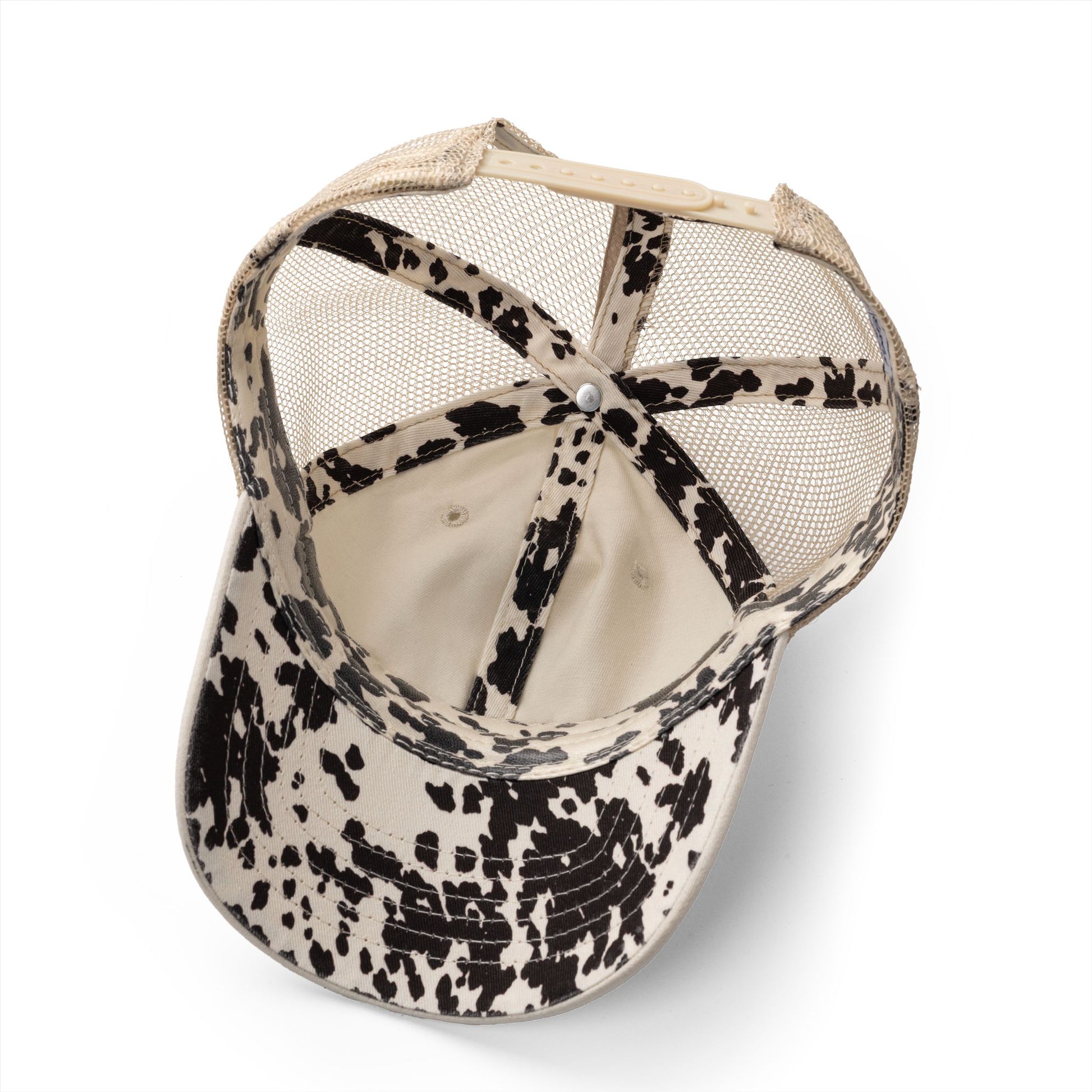 Baseball cap with black and white interior pattern on a white background