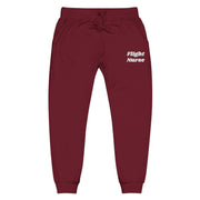 Maroon joggers with 'Flight Nurse' embroidered text on a white background